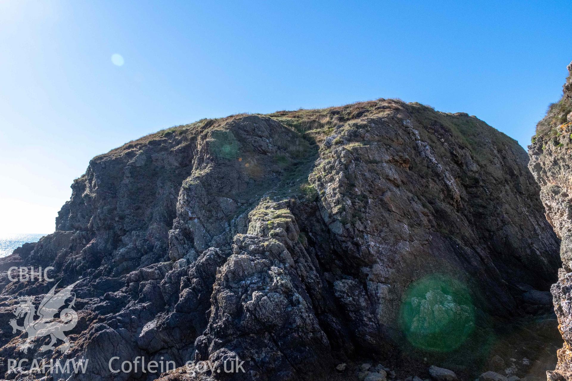 Ynys y Fydlyn Coastal Promontory Fort. Rock gully access onto western islet from the south.