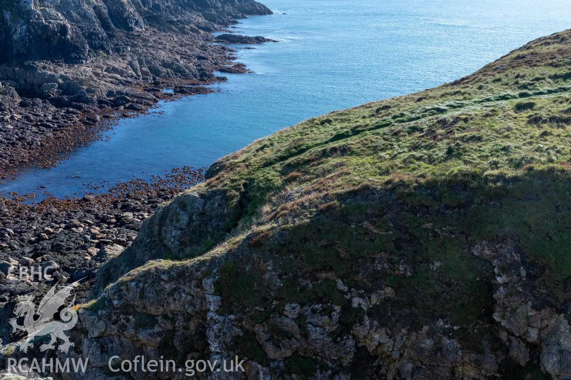 Ynys y Fydlyn Coastal Promontory Fort. View of the rock gully and access onto the western islet from the eastern islet.