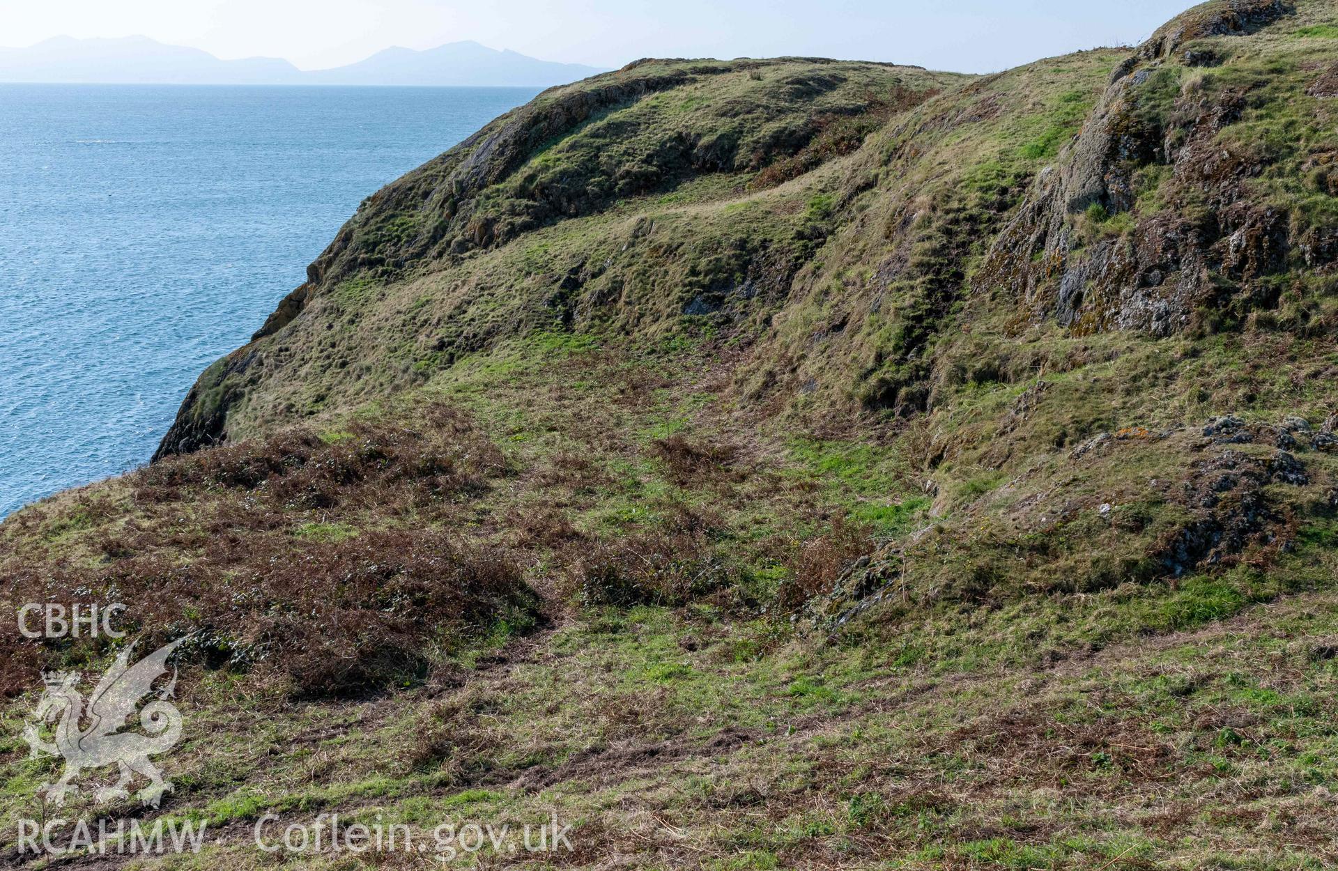 Twyn y Parc Coastal Promontory Fort. Flat interior area along edge of promontory, directly behind inner rampart and overlooking Porth Ceri-cochion.