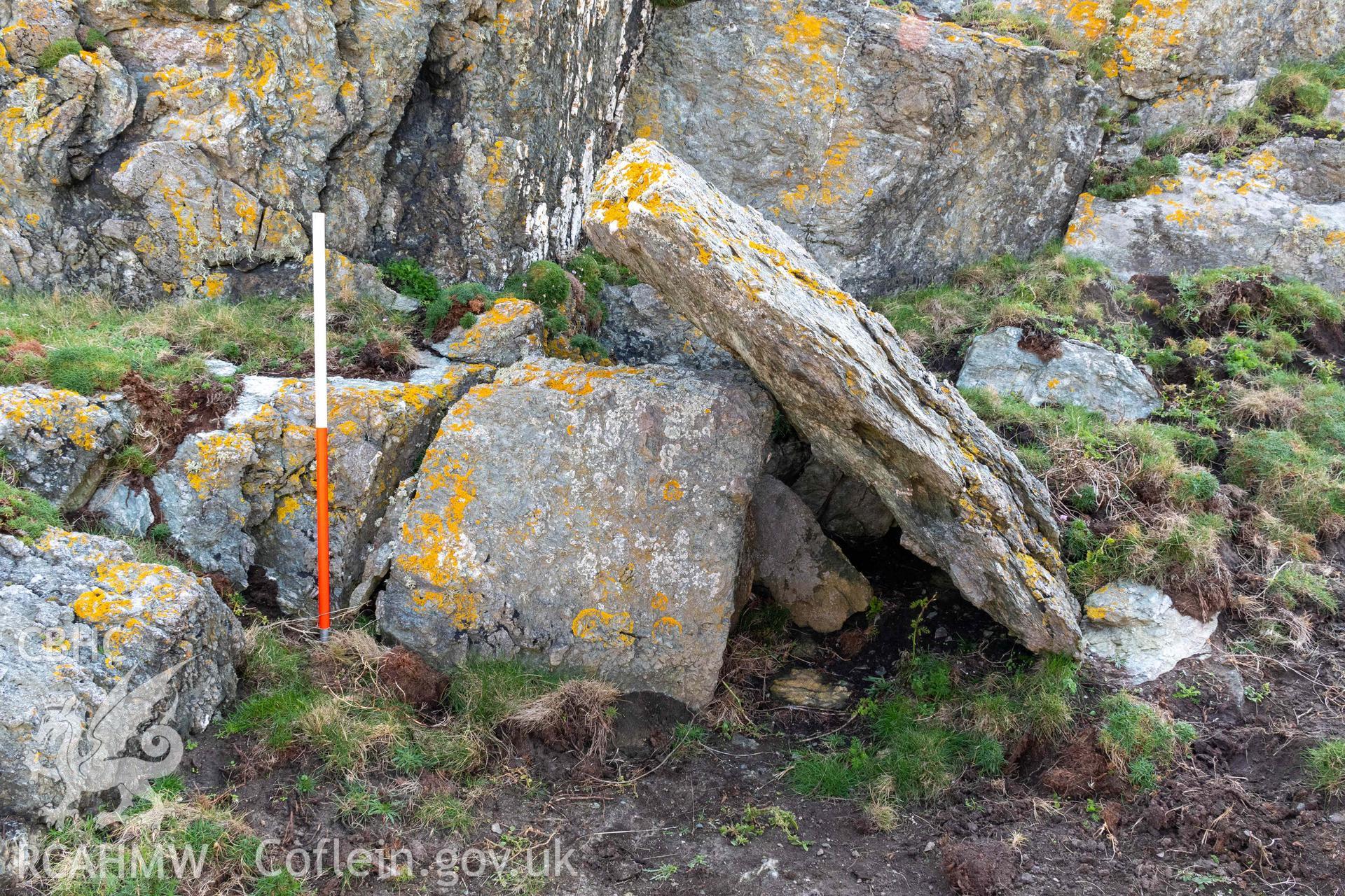 Twyn y Parc Coastal Promontory Fort. Conspicuous propped slab and boulder, not naturally placed, at SH 3675 6484 (with scale).