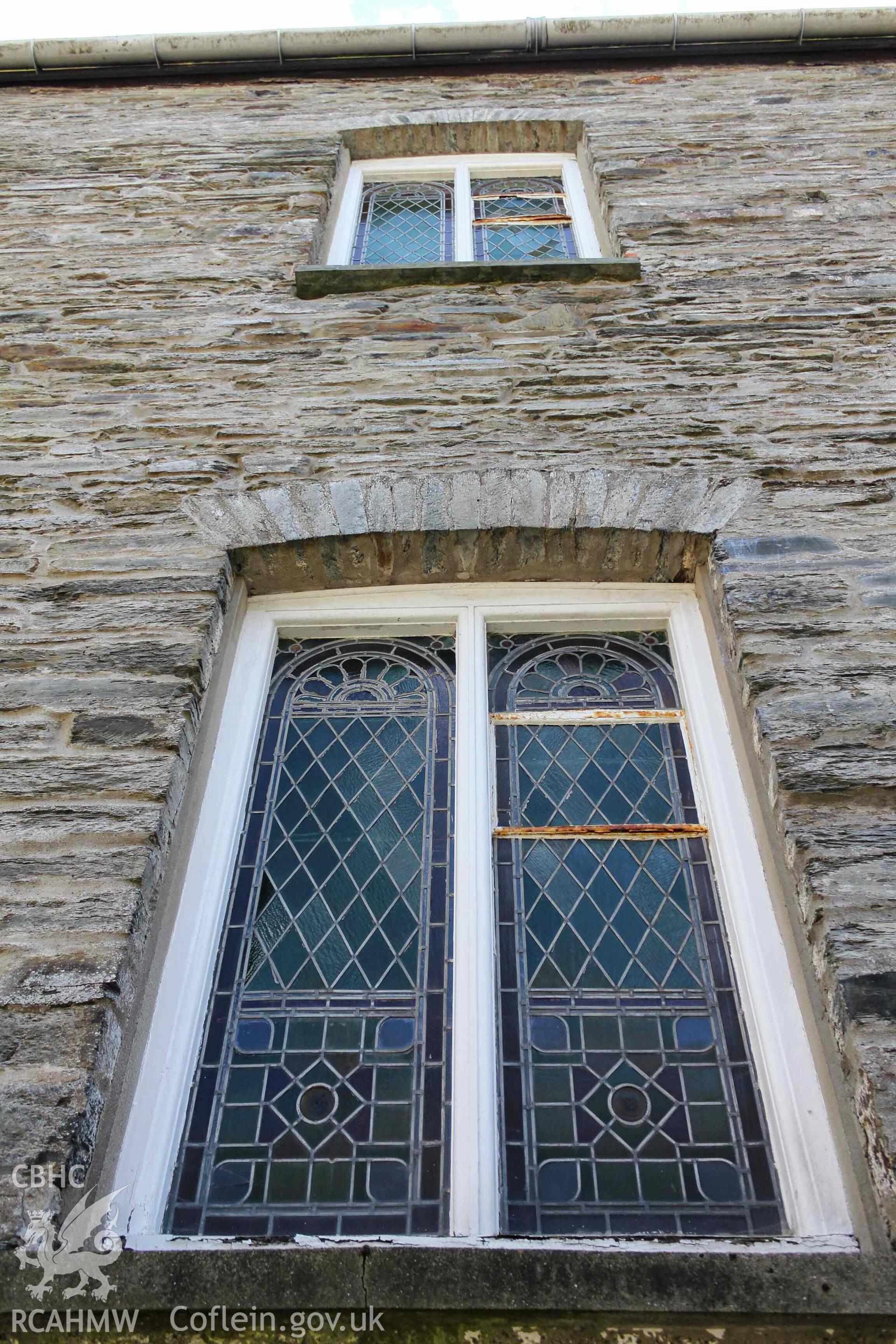 Exterior rear of chapel. Two stained glass windows on two levels. Tabernacl Cardigan