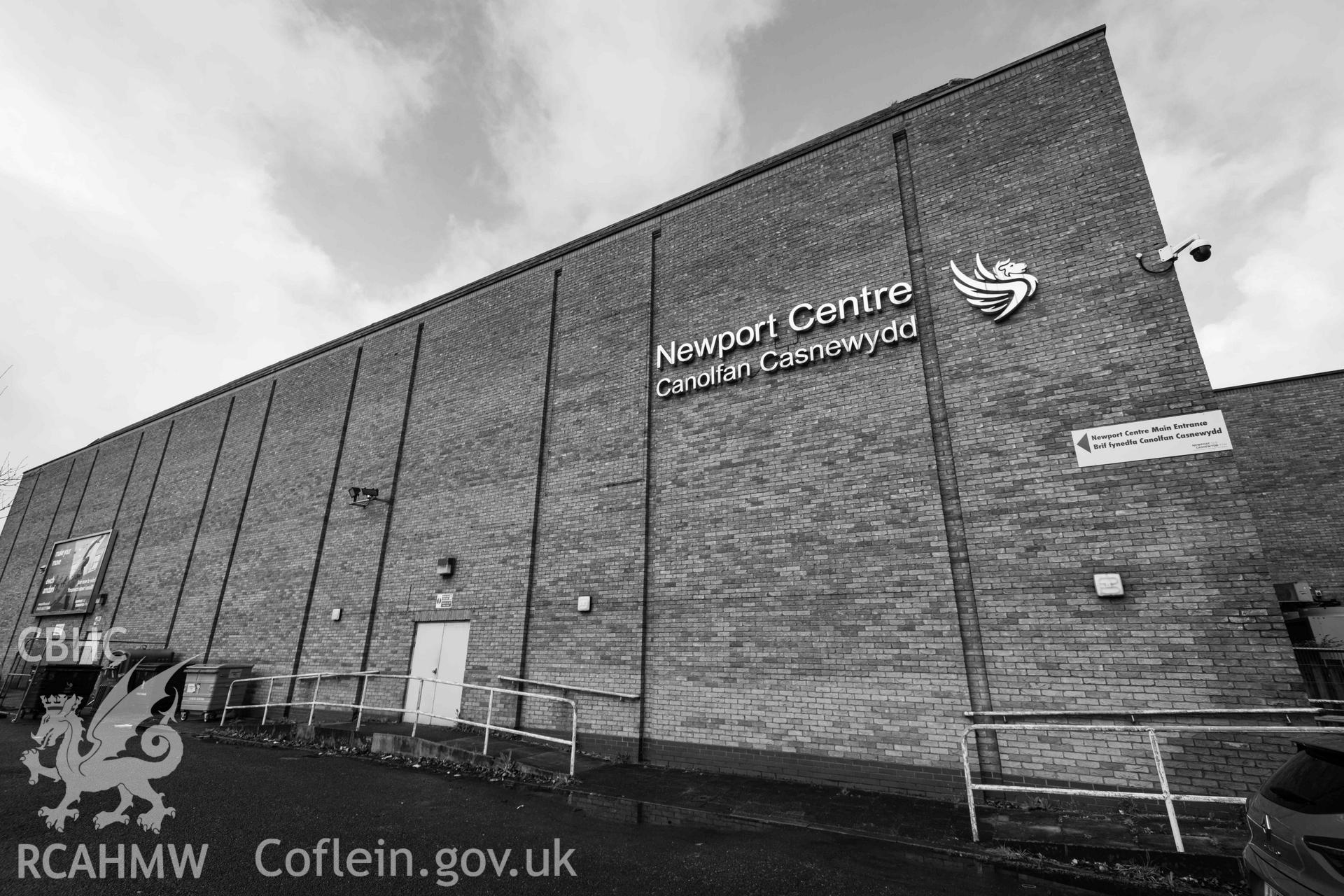 Newport Centre / Canolfan Casnewydd' signage. East wall. Low angle view. Black and white. Newport Centre