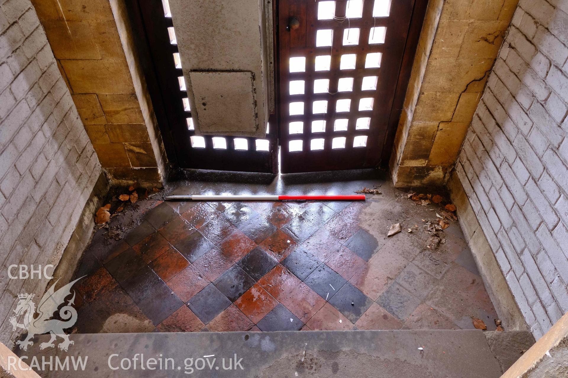 Photograph showing ground floor tile floor looking S, from a Level 3 Historic Building Record for The Old Probate Registry, Llandaff, Cardiff. Prepared by Holland Heritage in 2024 as a condition of listed planning consent.