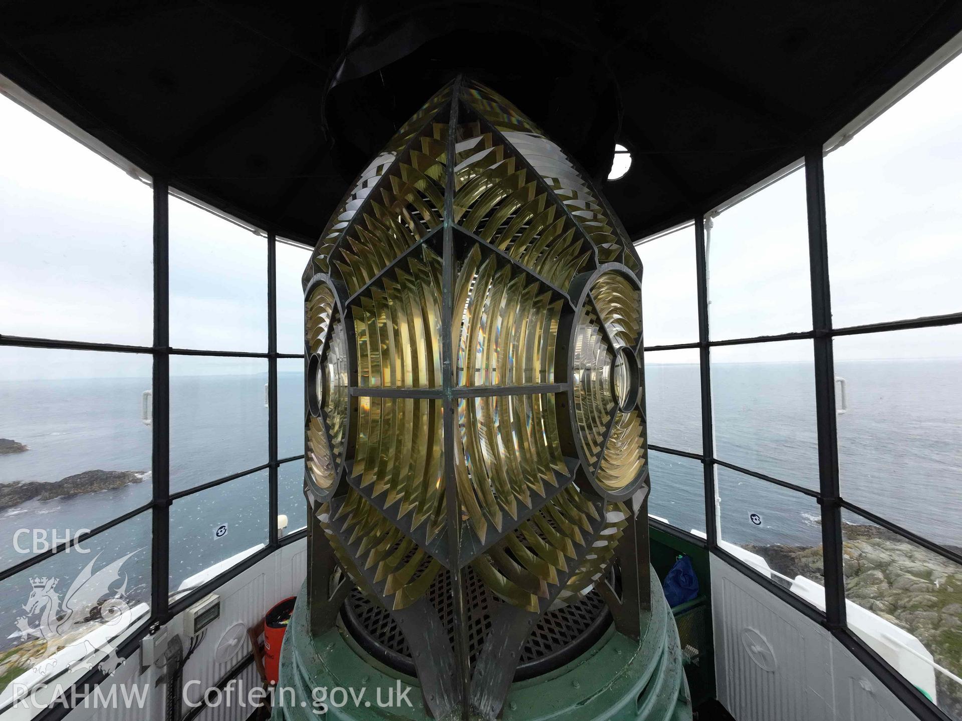 Wide-angle view, at the level of the focal plane, of one edge of the Fresnel lens within the Skerries Lighthouse lantern room on 16/07/2024.