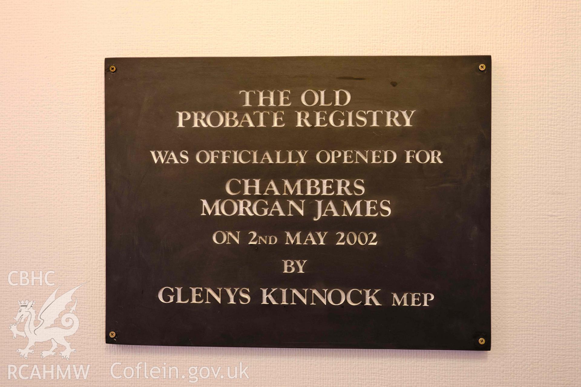 Photograph showing plaque in SE wall of second floor, from a Level 3 Historic Building Record for The Old Probate Registry, Llandaff, Cardiff. Prepared by Holland Heritage in 2024 as a condition of listed planning consent.