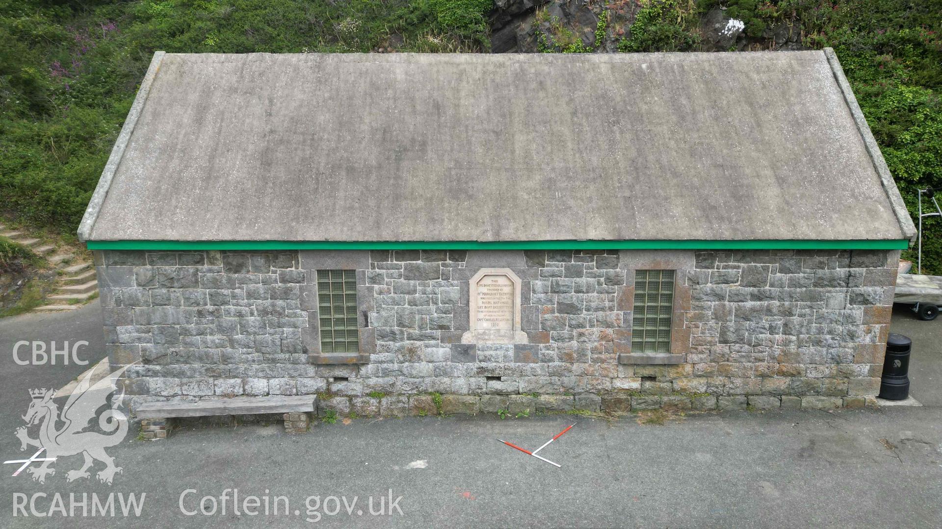 Old Lifeboat Station, Solva. Harbour-side elevation (southeast), including building memorial dedication, on 18/06/2024. Scales are 1m