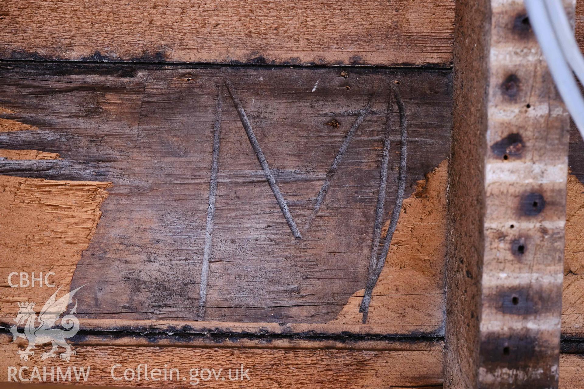 Photograph showing Room G14, carpentry mark on underside of floorboard, from a Level 3 Historic Building Record for The Old Probate Registry, Llandaff, Cardiff. Prepared by Holland Heritage in 2024 as a condition of listed planning consent.