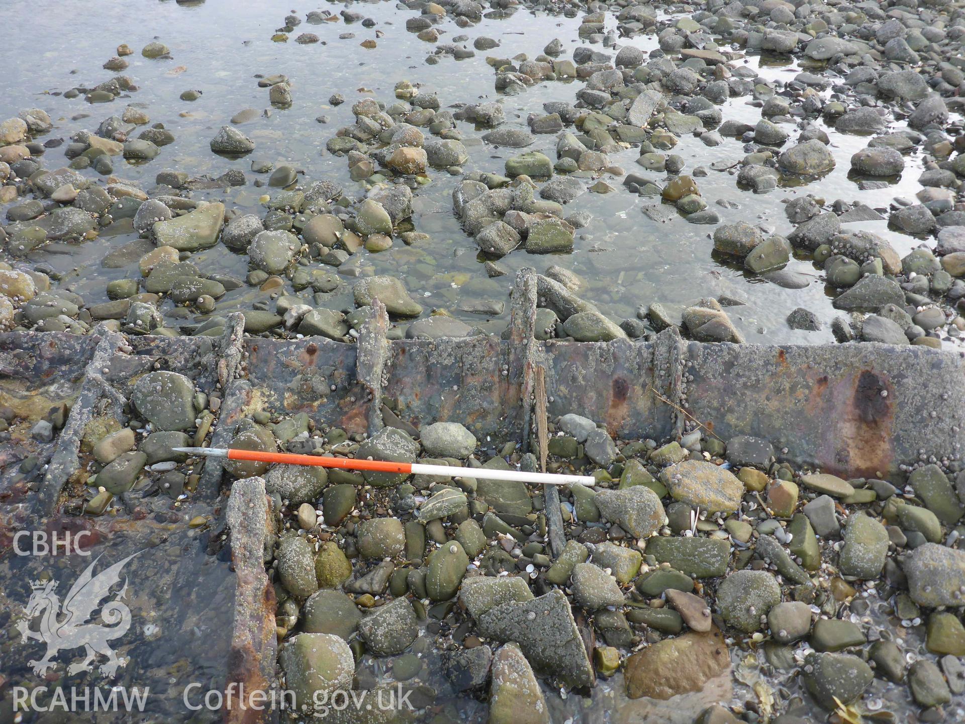 The wreck of the HENRY BELL on 17/10/2024. Inboard view of iron hull plates and framing on the eastern side of the site. Scale is 1m.