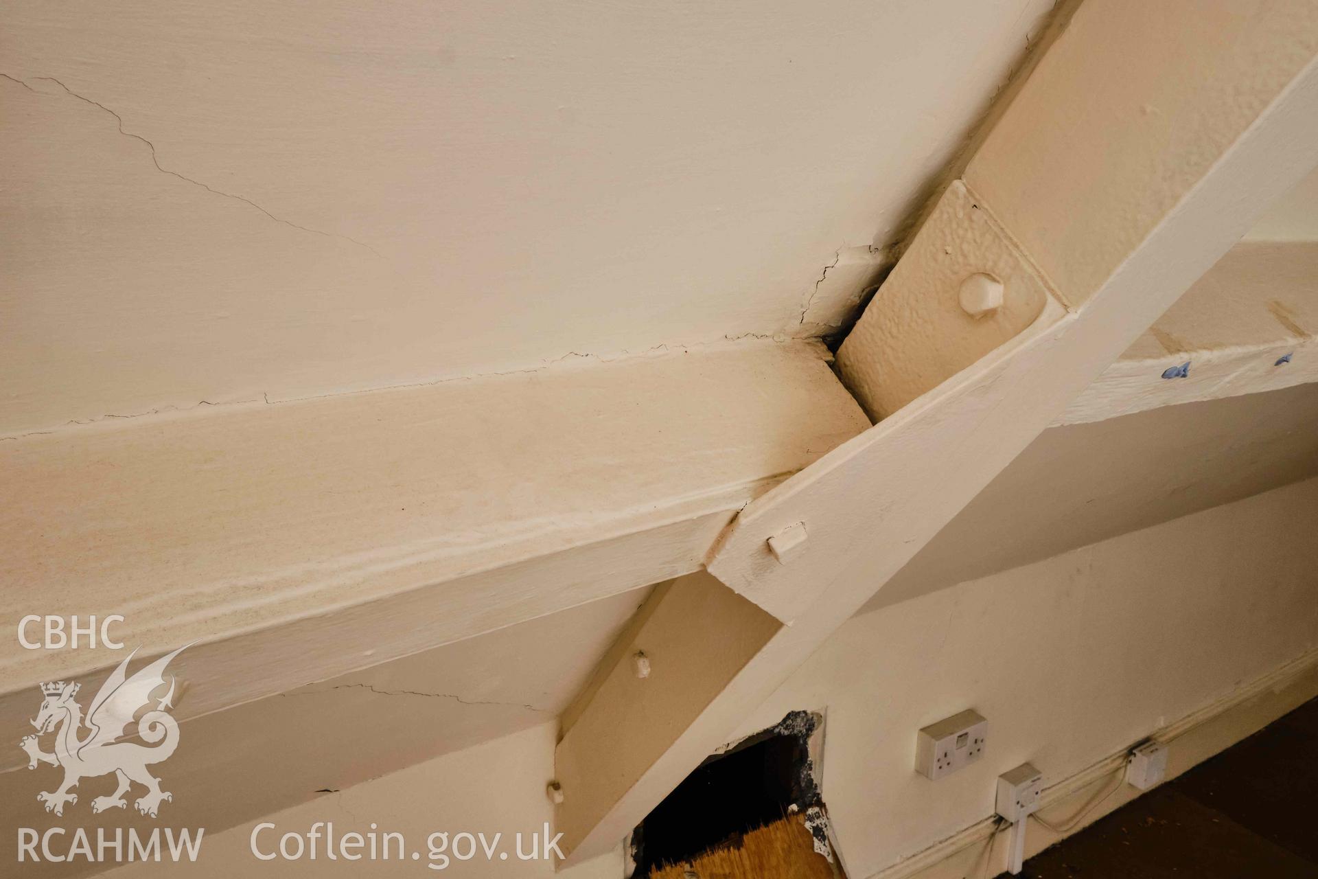 Photograph showing Room 2.2, bolted plate reinforcing truss, from a Level 3 Historic Building Record for The Old Probate Registry, Llandaff, Cardiff. Prepared by Holland Heritage in 2024 as a condition of listed planning consent.