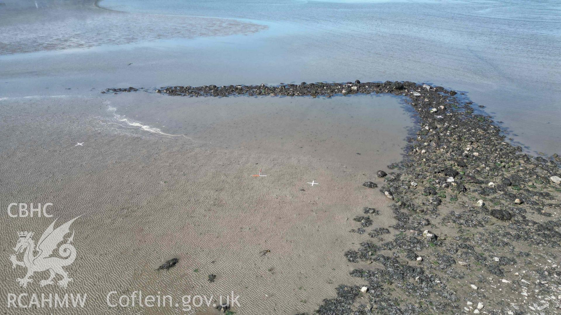 Oblique view, looking north, of Goodwick Fish Trap 2 at low tide on 09/05/2024. Scales are 1m.