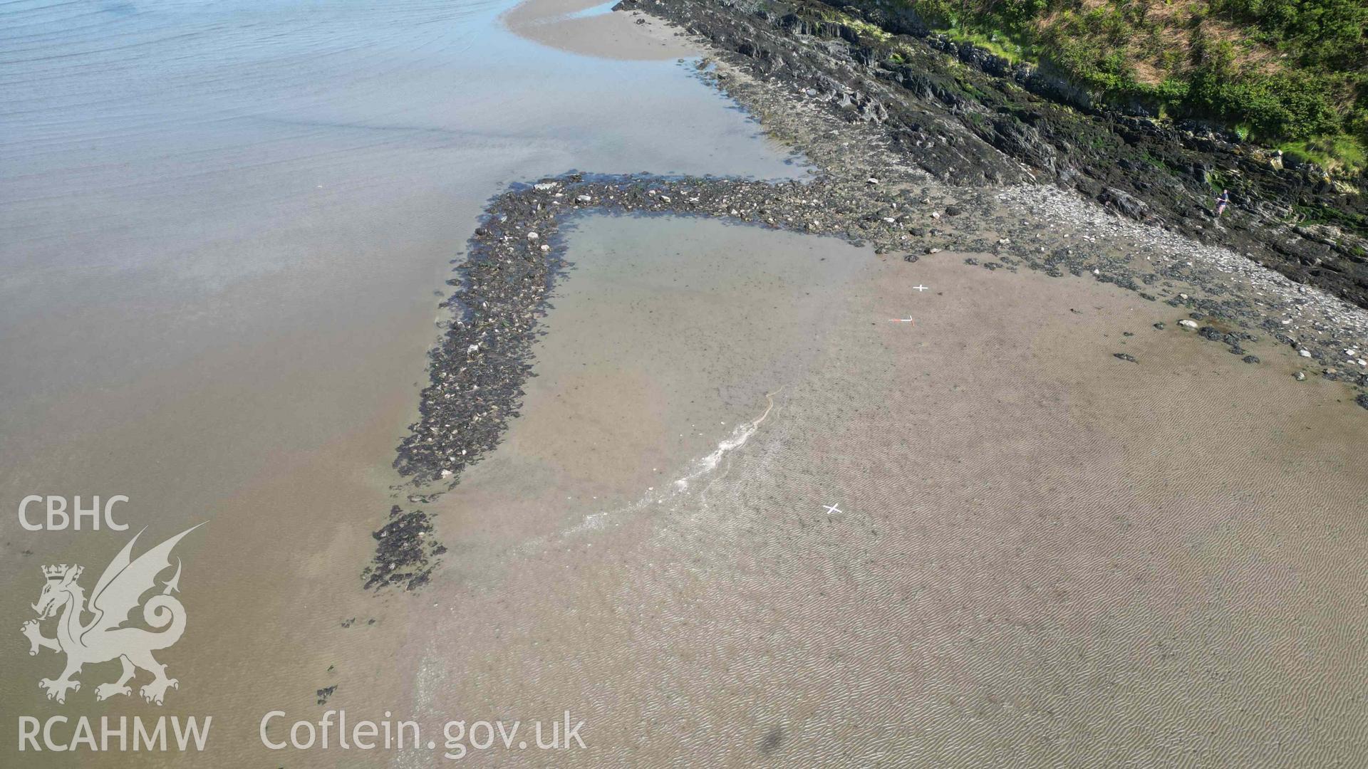 Oblique view, looking east, of Goodwick Fish Trap 2 at low tide on 09/05/2024. Scales are 1m.