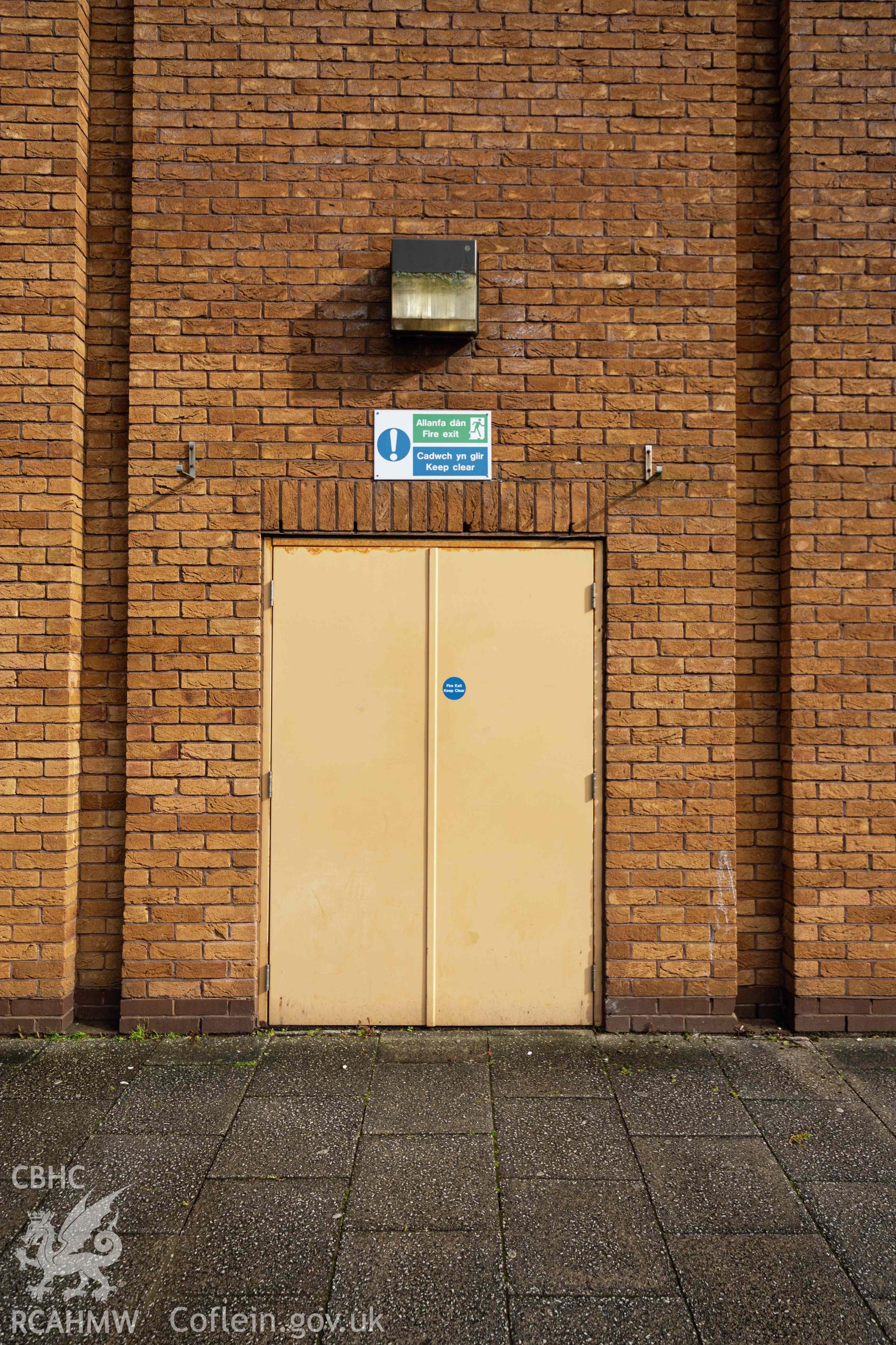 Fire exit door. Exterior. Portrait orientation. Newport Centre