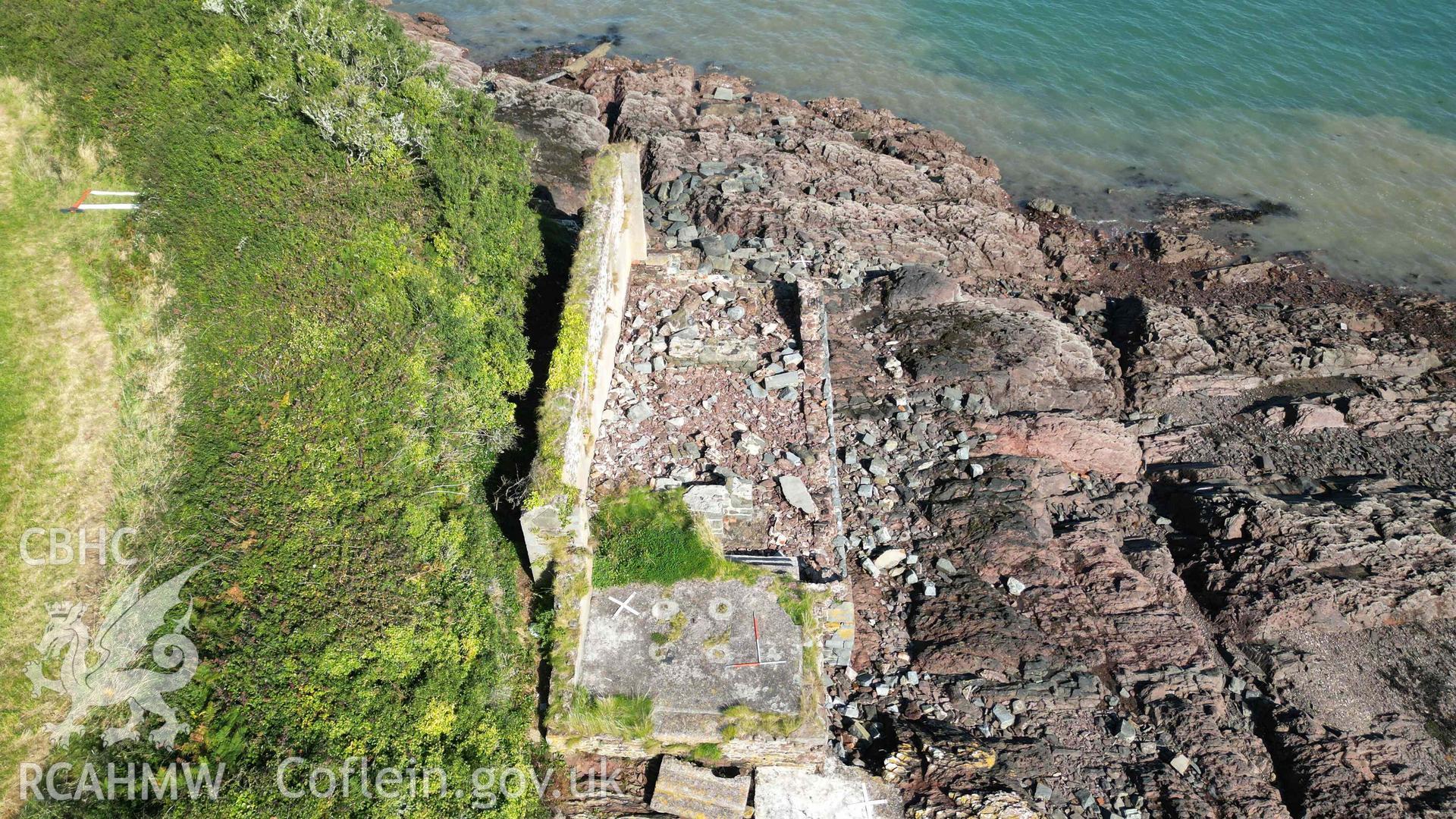 Oblique view of the Old Lifeboat Station at Angle looking north on 19/09/2024. Scales are 1m.