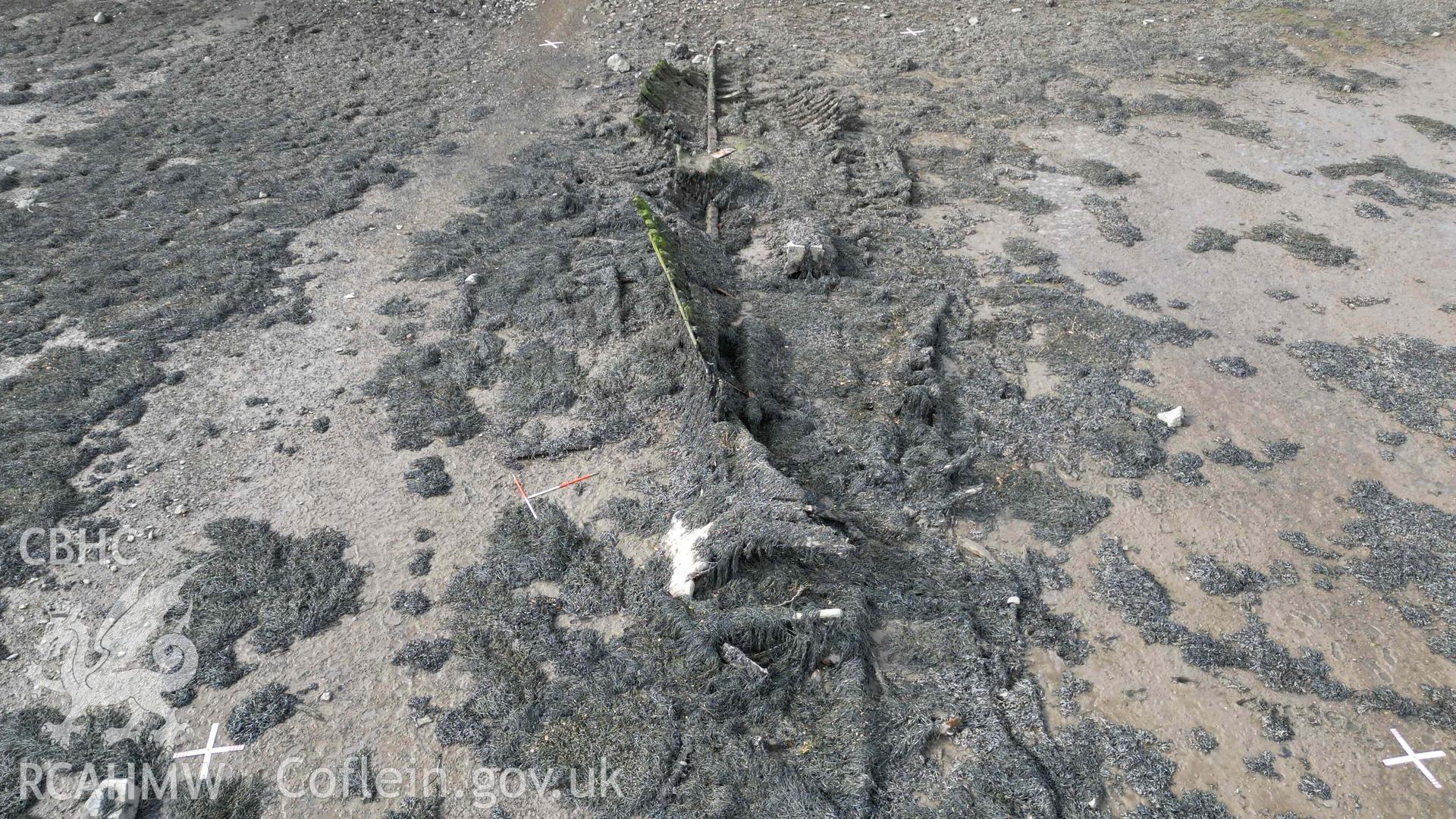 Oblique view of the wreck of the Helping Hand, looking west on 20/09/2024. Scales are 1m.
