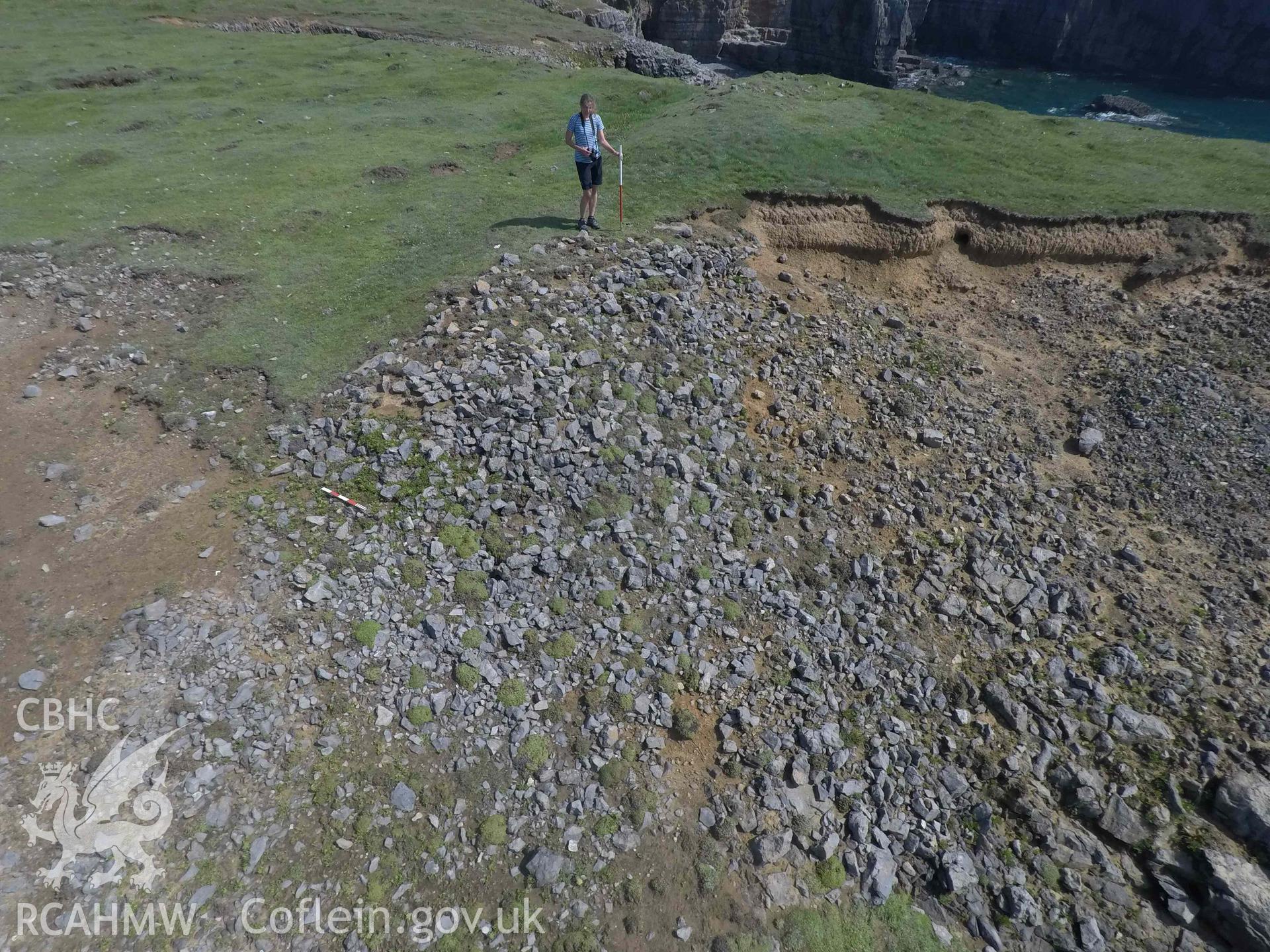 Linney Head Promontory Enclosure 11 August 2020. Detail of  exposed walling on inner face of enclosure bank.