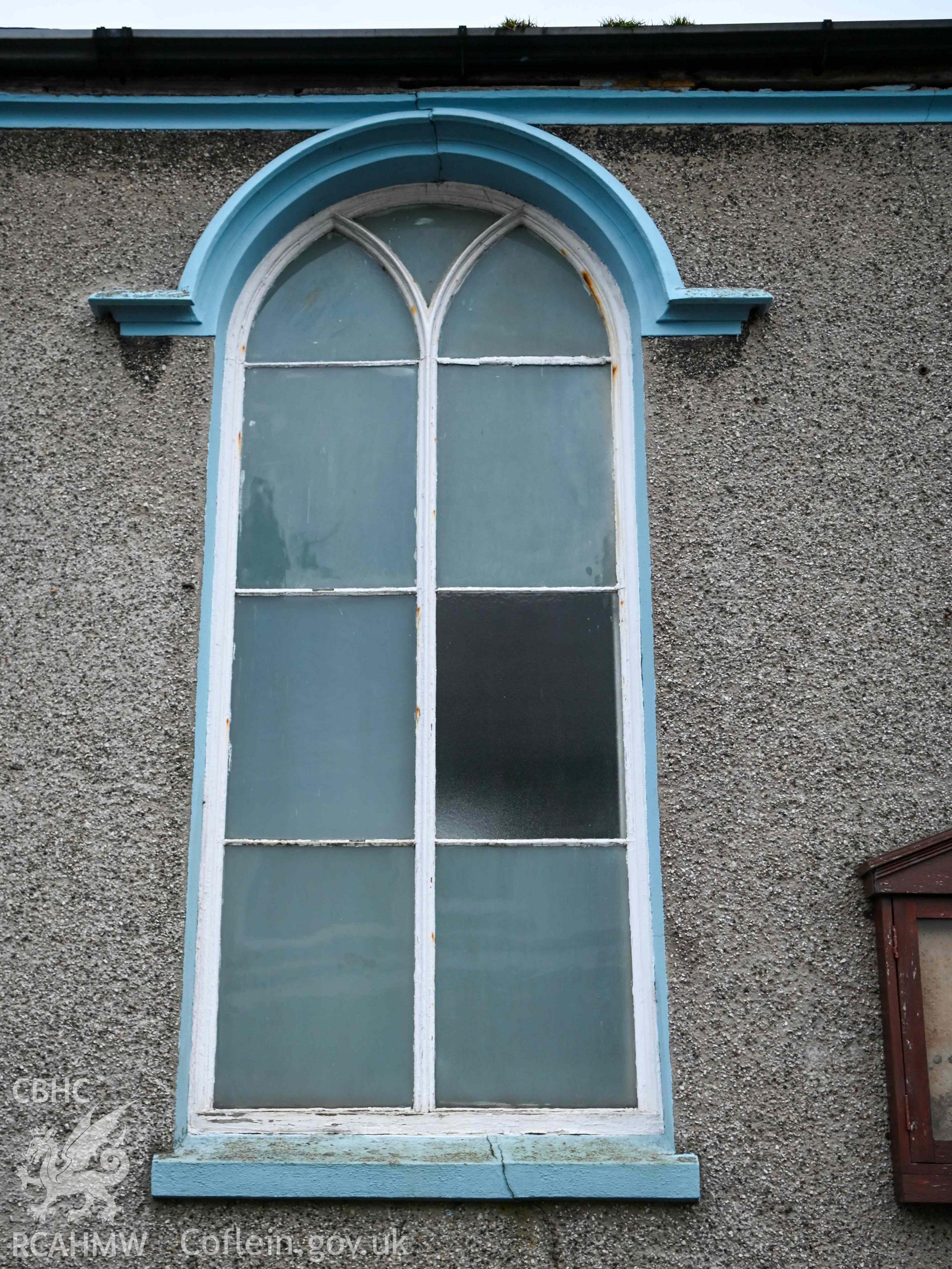 Bethel Welsh Independent Chapel, Cemaes - Detailed view of a window next to the chapels service board, taken from North-West