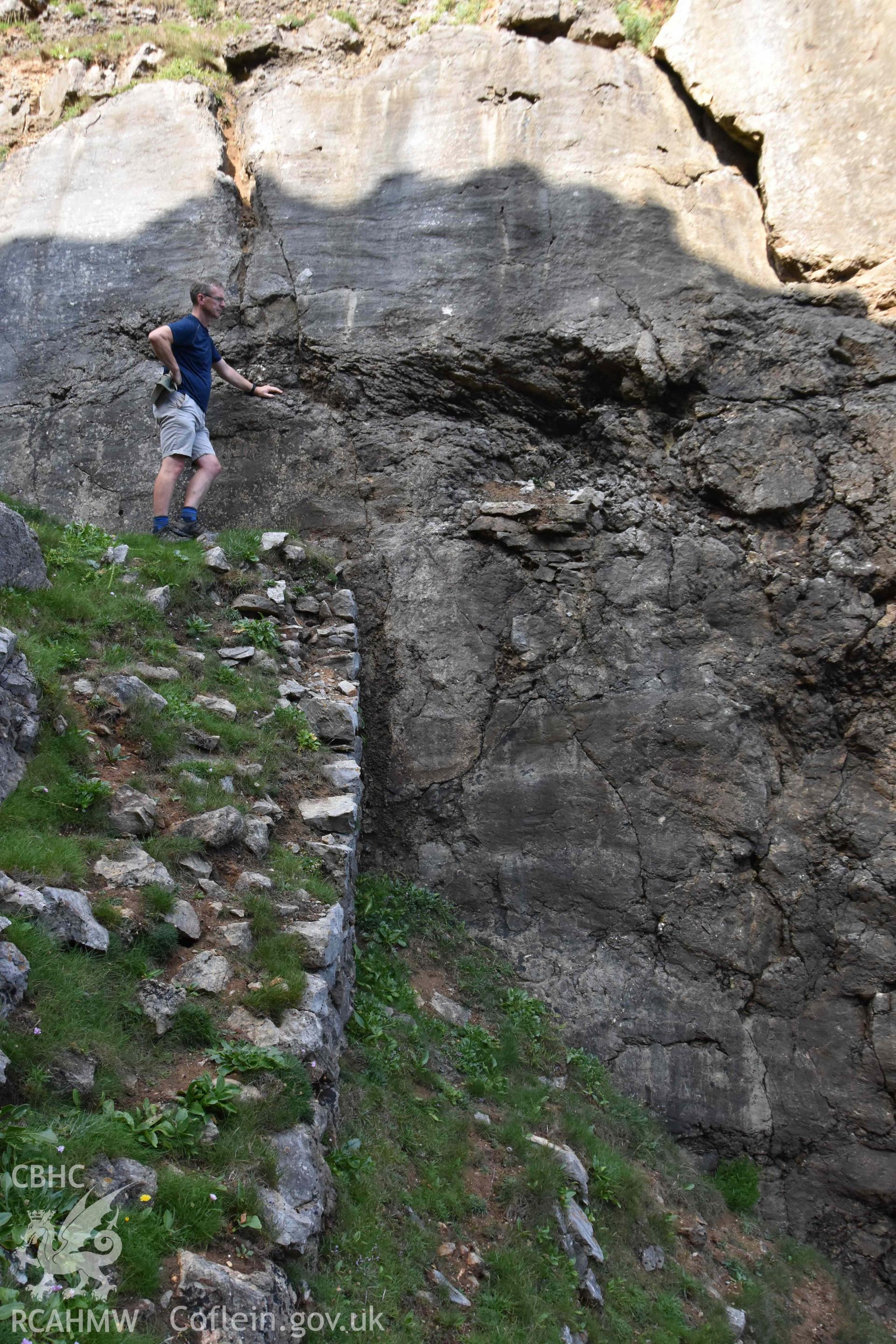 Quay wall, east end with feature in quarry face..