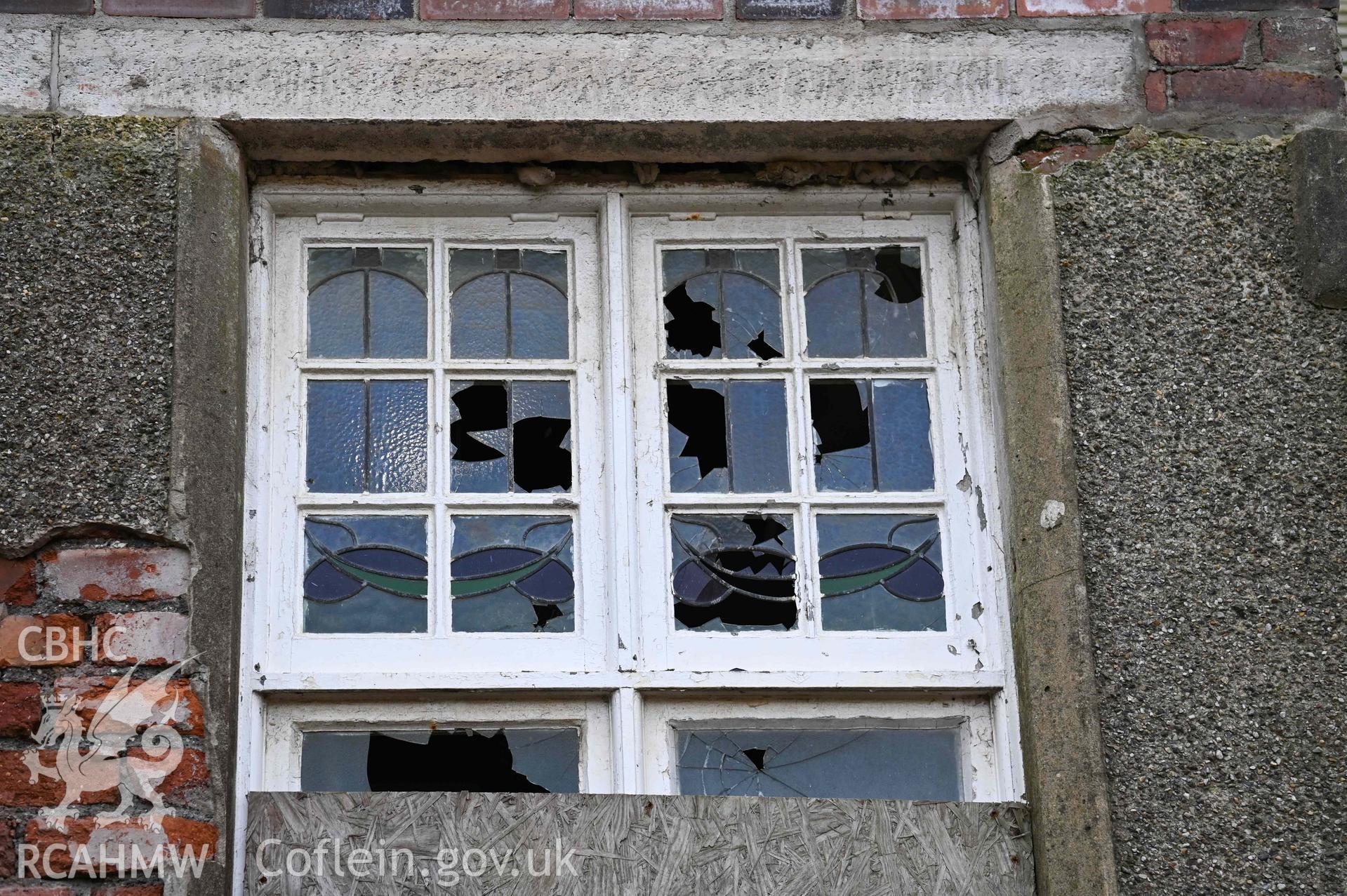 Carmel Welsh Independent Chapel - Close-up detail of shattered and boarded up window, taken from the East