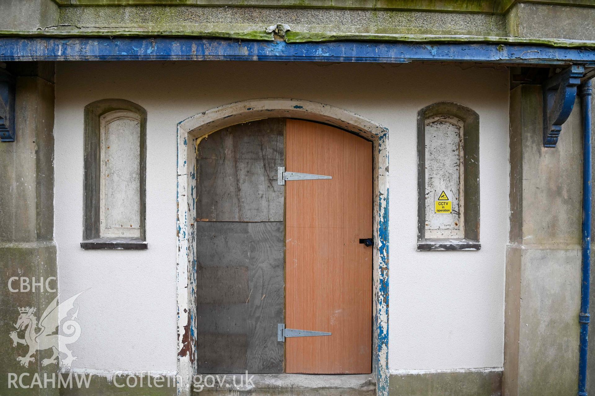 Carmel Welsh Independent Chapel - Exterior, detail of side entrance door with small windows either side, taken from North-East