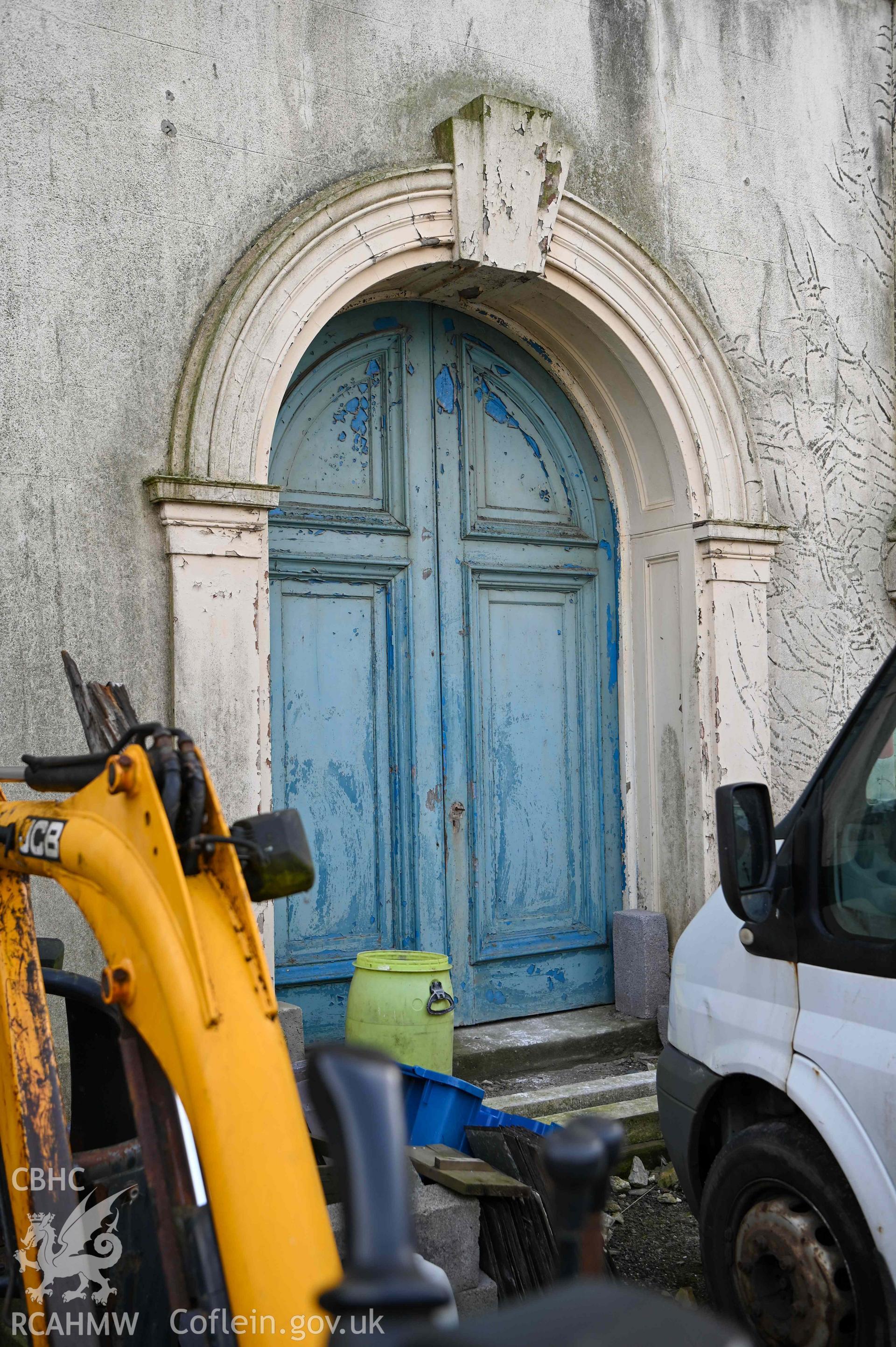 Carmel Welsh Independent Chapel - Closer view of front door, vehicles partially obscuring view, taken from East