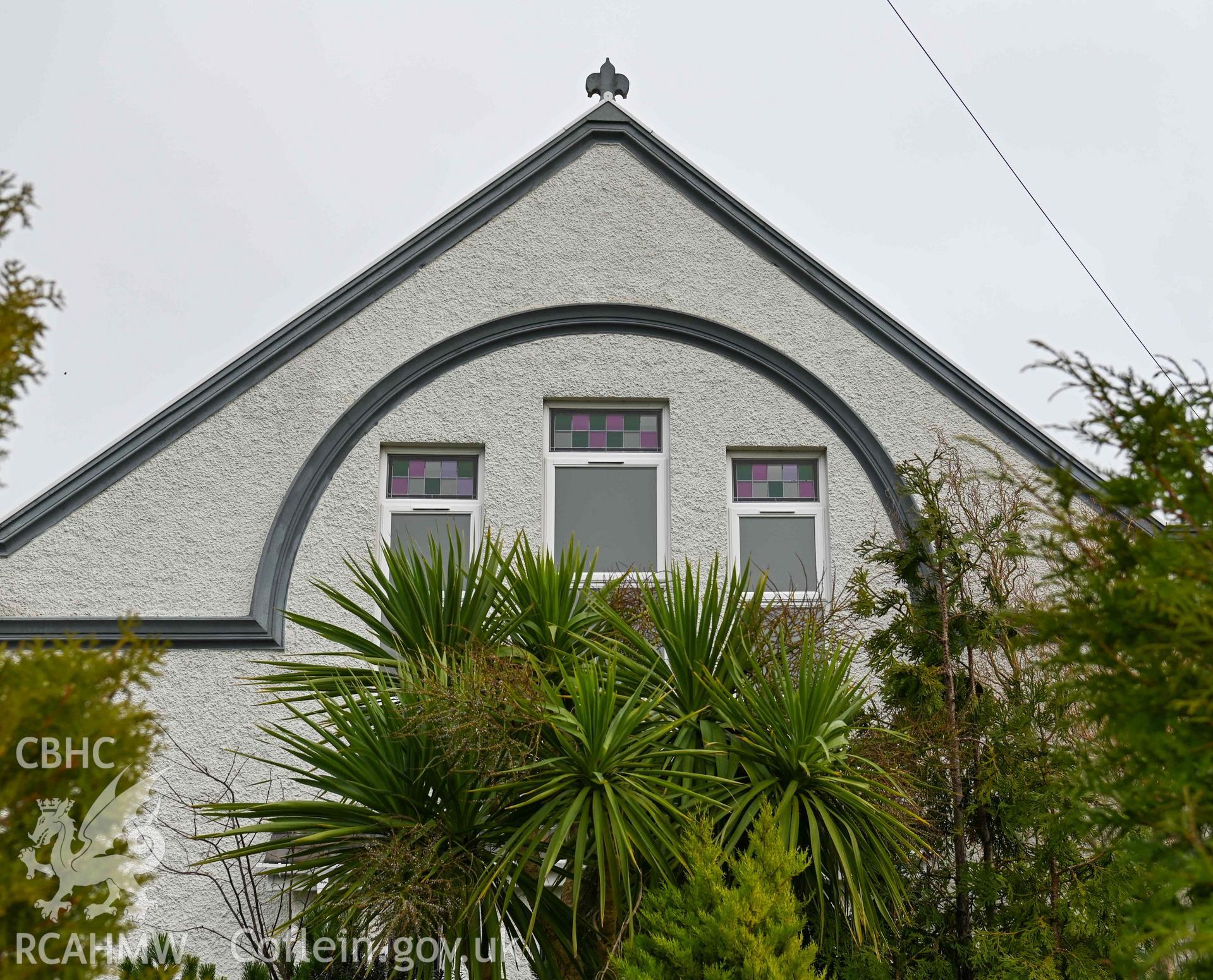 Capel M.C; Rhyd Sunday School - Detailed view of Sunday School front, lower portion obscured by trees, taken from South