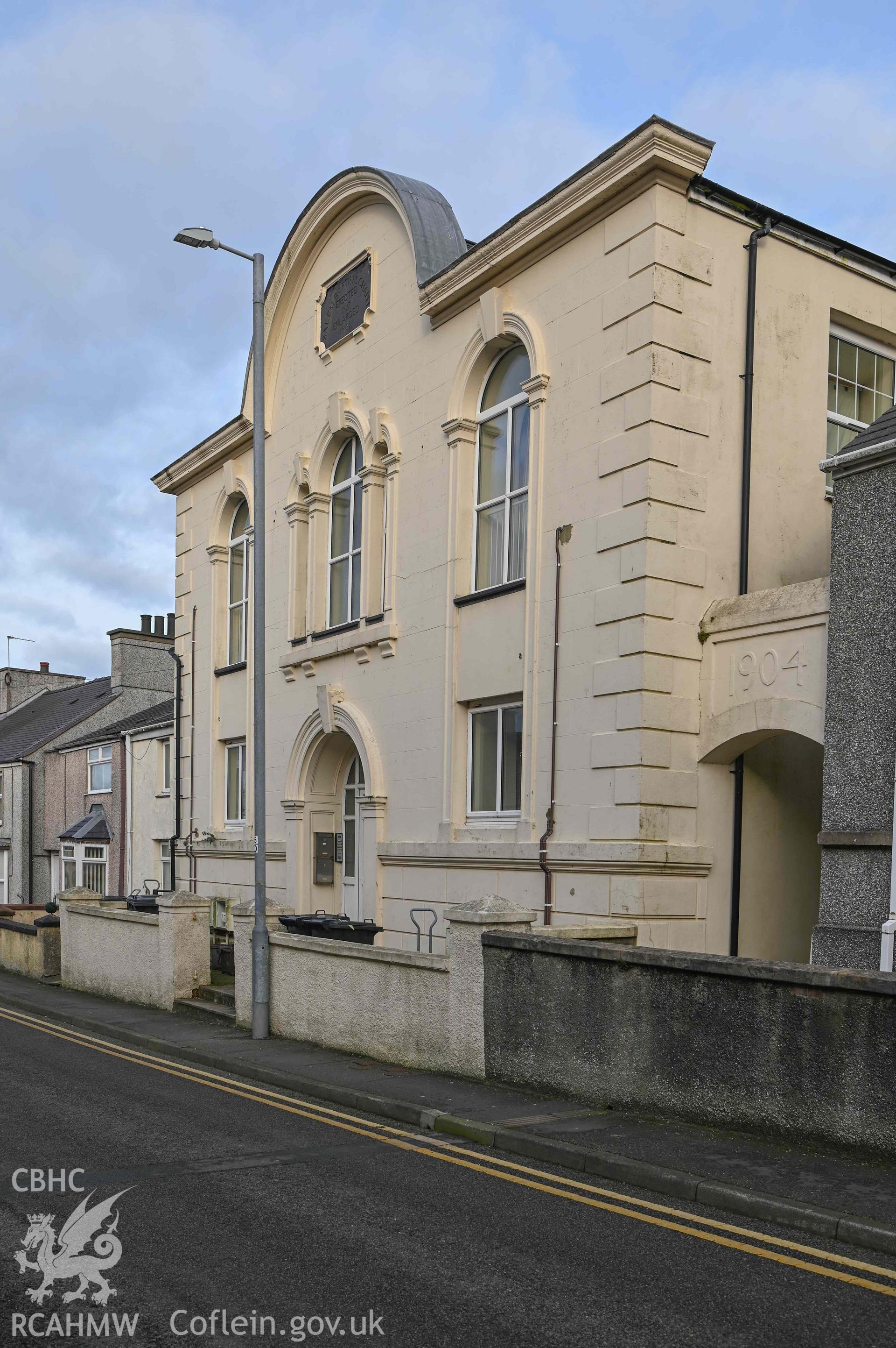 Salem Welsh Baptist Church - Closer, view of front and side of the church, plaque and inscription above entrances visible, taken from South