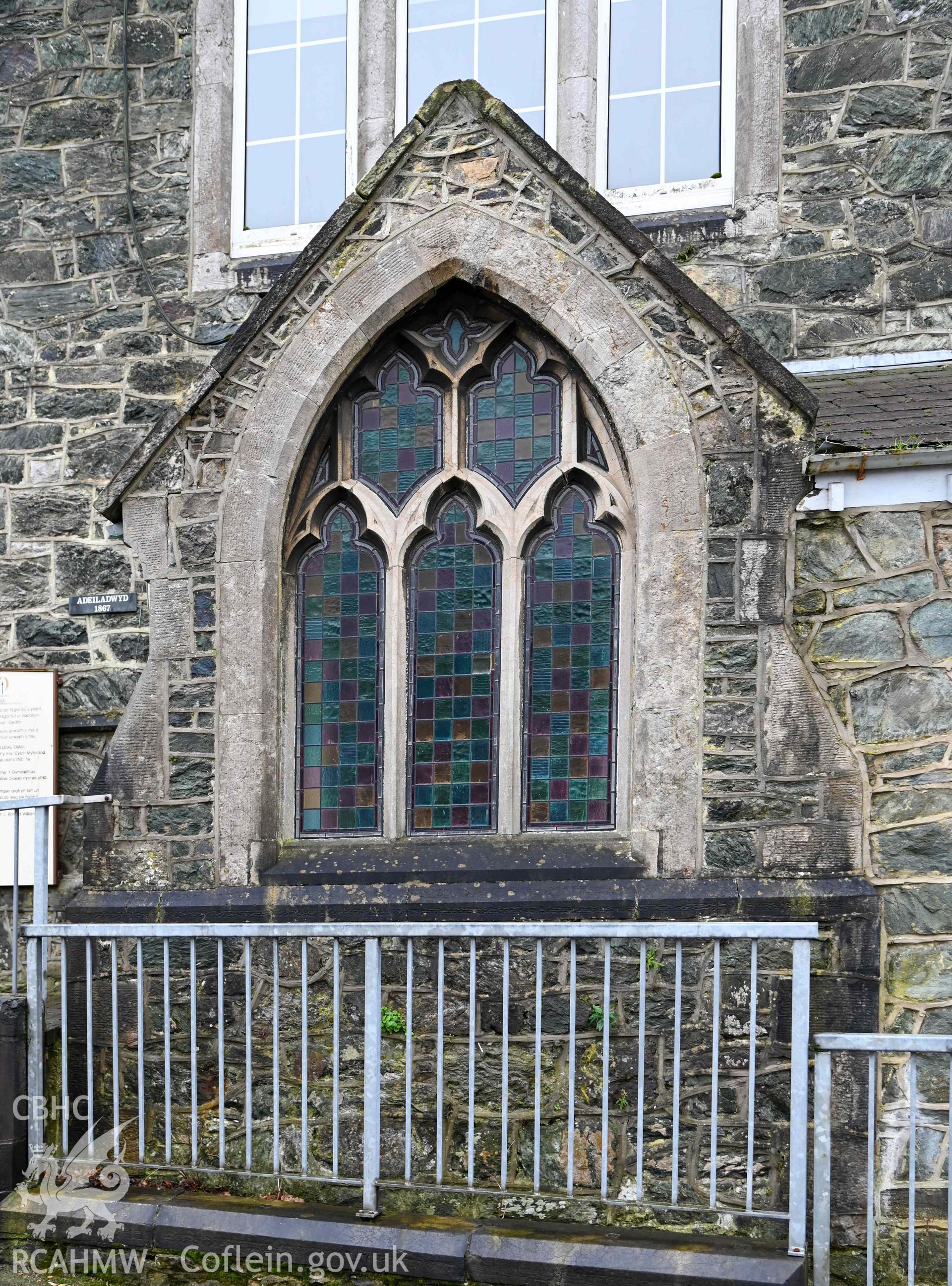 Tabernacl Welsh Independent Chapel - View of the stained glass windows on the chapel porch, taken from North