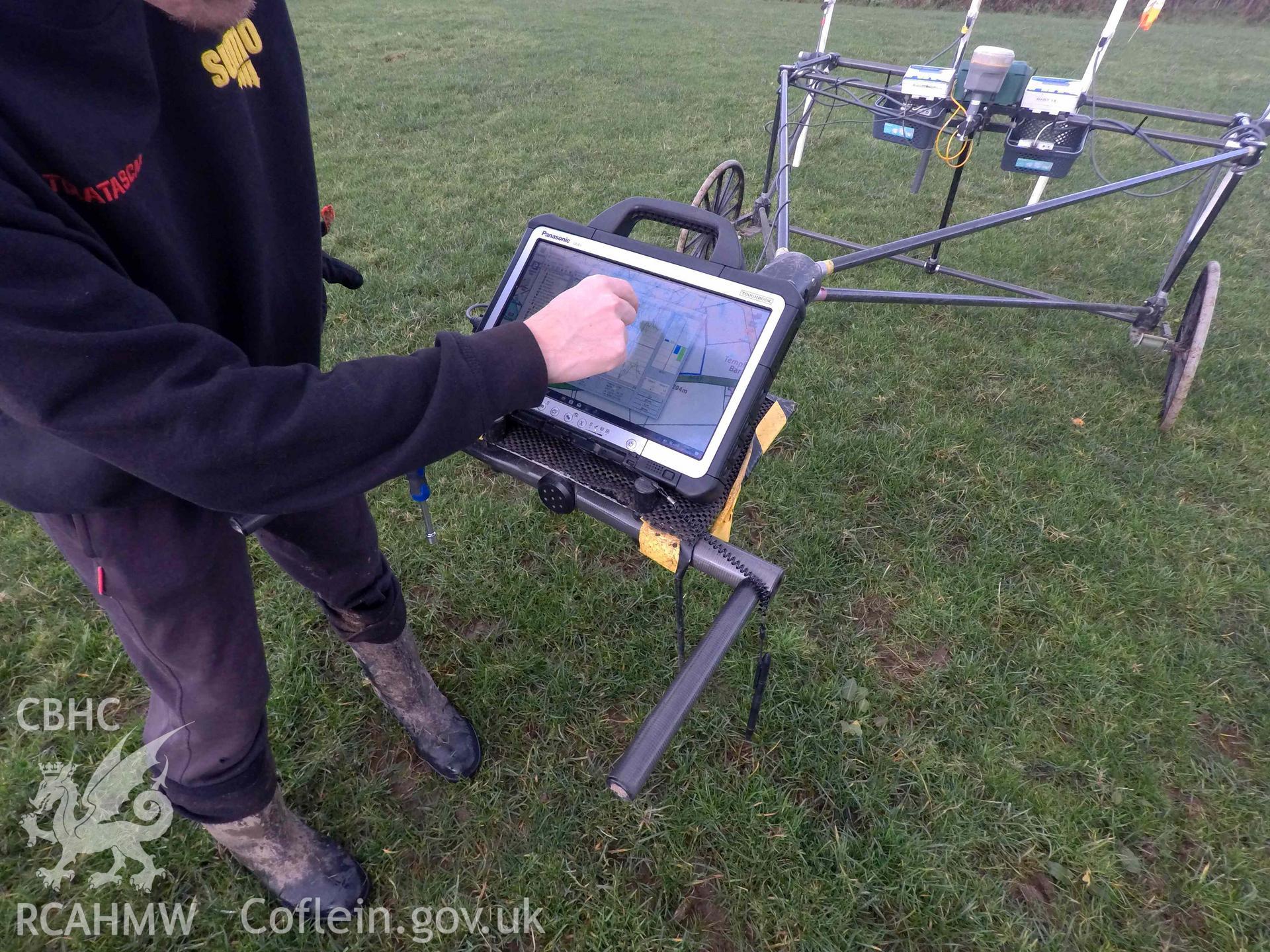 Castell Nadolig: geophysical (magnetometry) survey in progress by Robert Knight of SUMO Survey