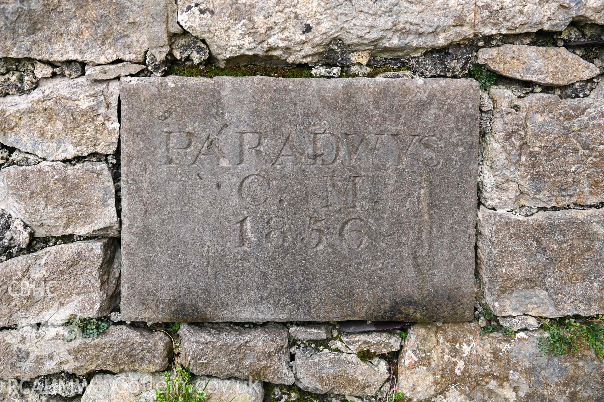 Paradwys Chapel - Detailed view of a plaque on the chapels wall, taken from West