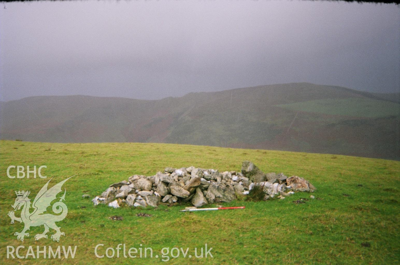Digital colour photograph of Godor clearance cairn XII taken on 05/12/2006 by B. Britton during the Berwyn North East Upland Survey by Archaeophysica.