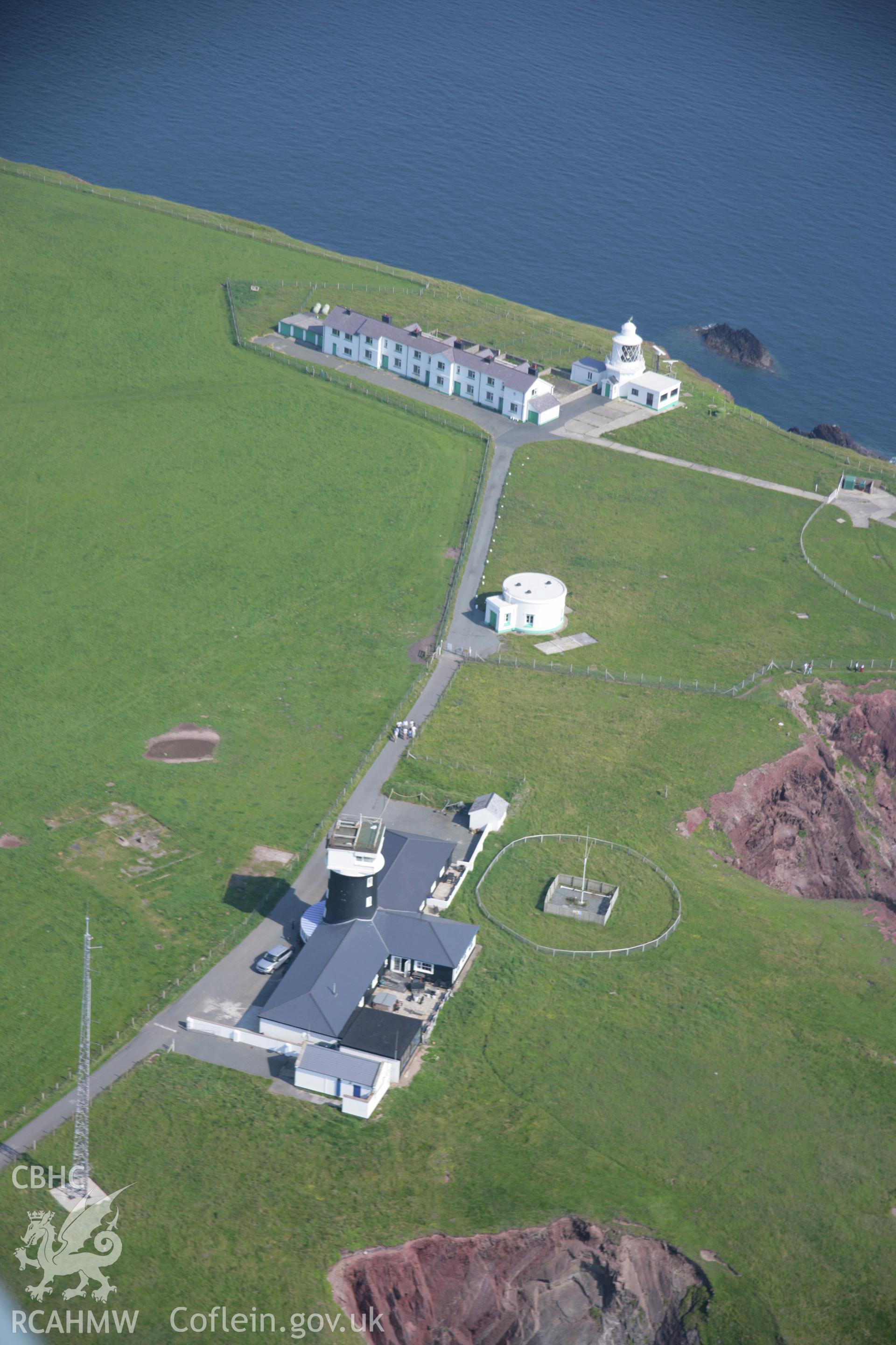 RCAHMW colour oblique aerial photograph of St Ann's Head Lighthouses from the north-west. Taken on 08 June 2006 by Toby Driver.
