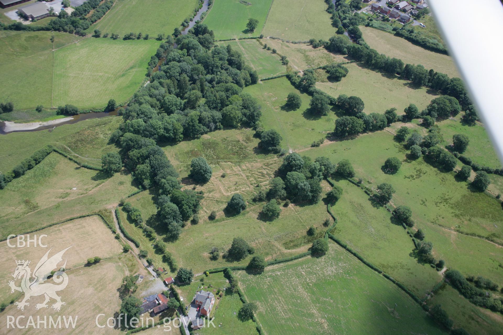 RCAHMW colour oblique aerial photograph of Castell Collen Roman Fort. Taken on 27 July 2006 by Toby Driver.