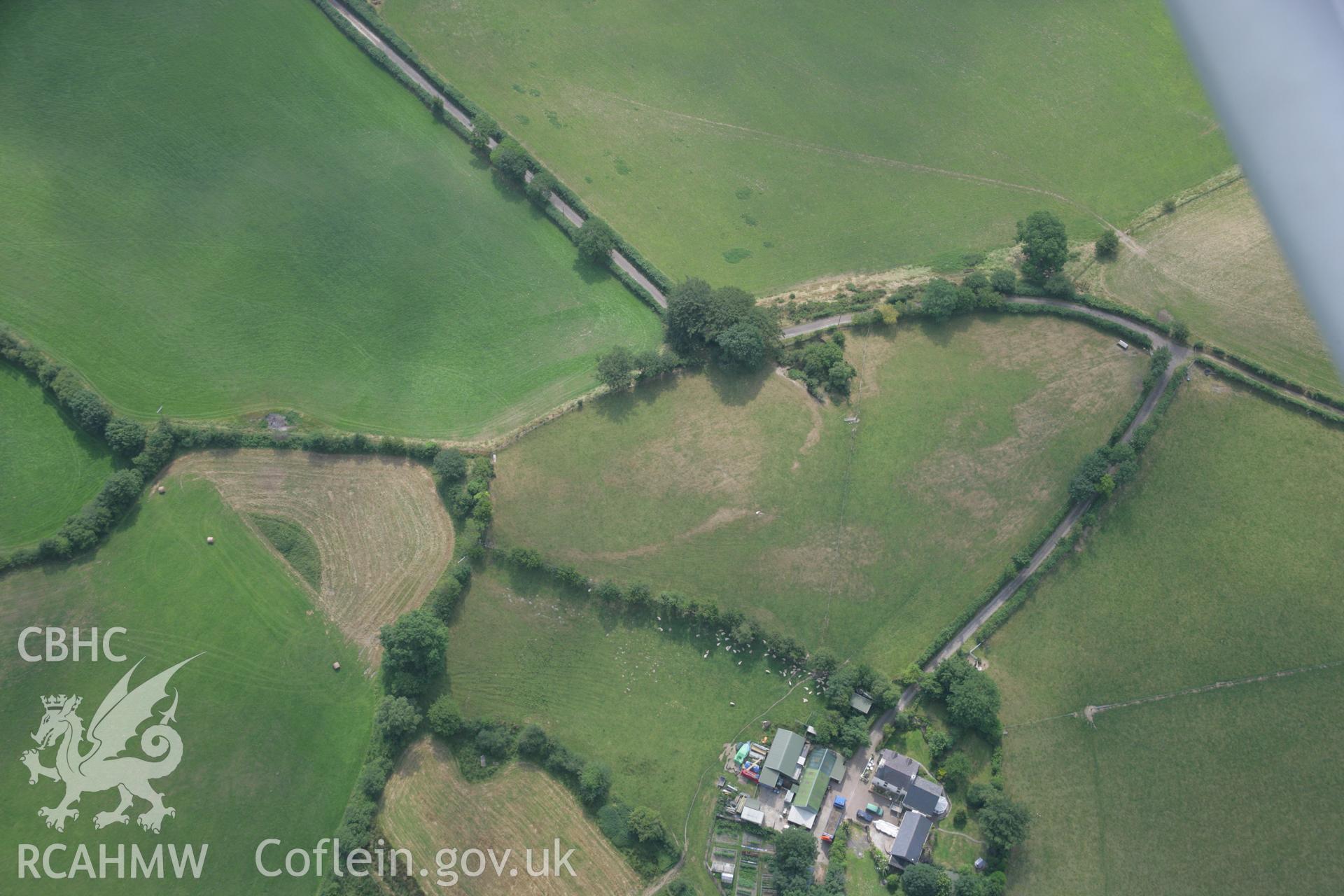 RCAHMW colour oblique aerial photograph of Pen-y-Gaer, Deri-Odwyn. Taken on 21 July 2006 by Toby Driver.