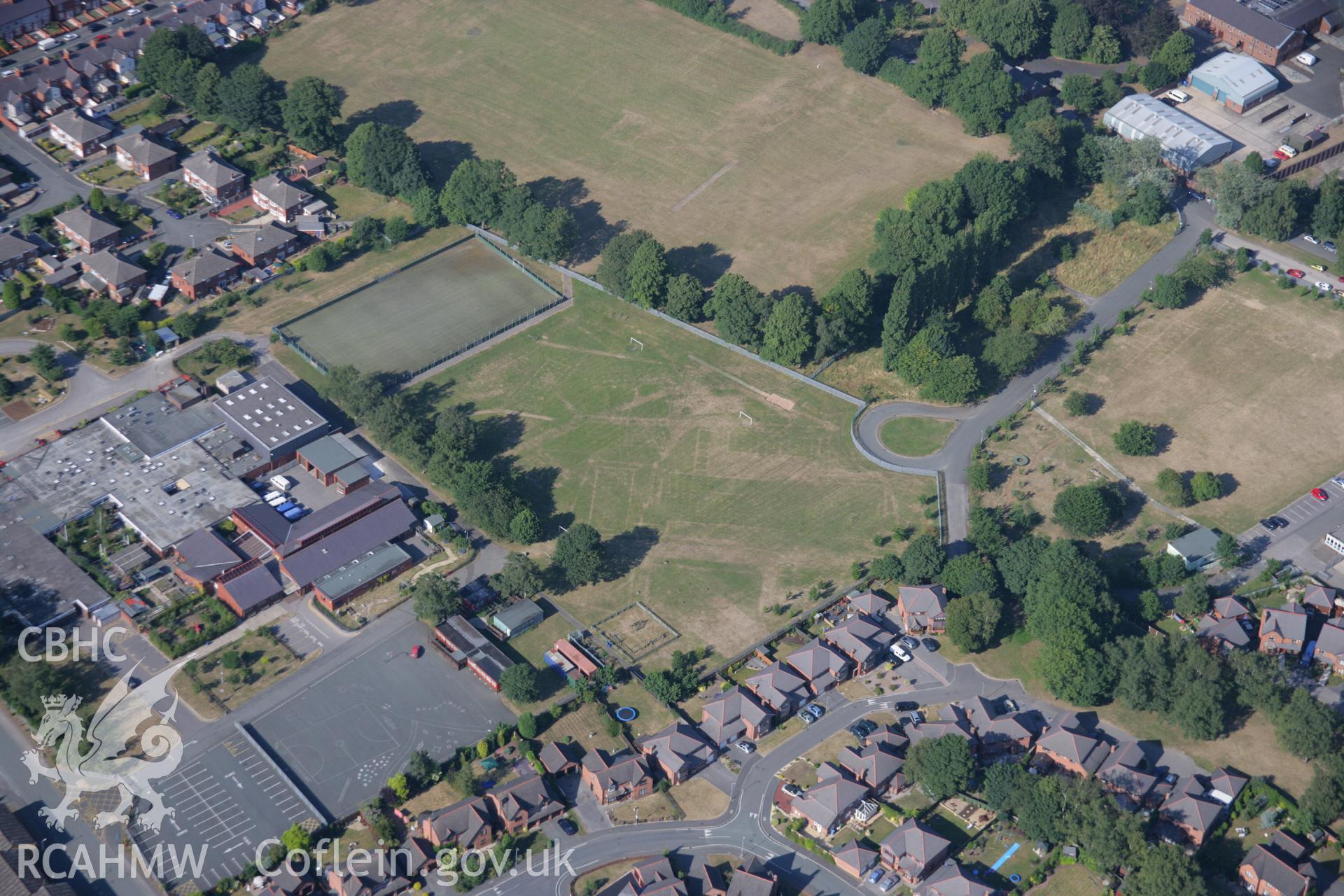 RCAHMW colour oblique aerial photograph of cropmarks of Former Barracks at Hightown. Taken on 17 July 2006 by Toby Driver.