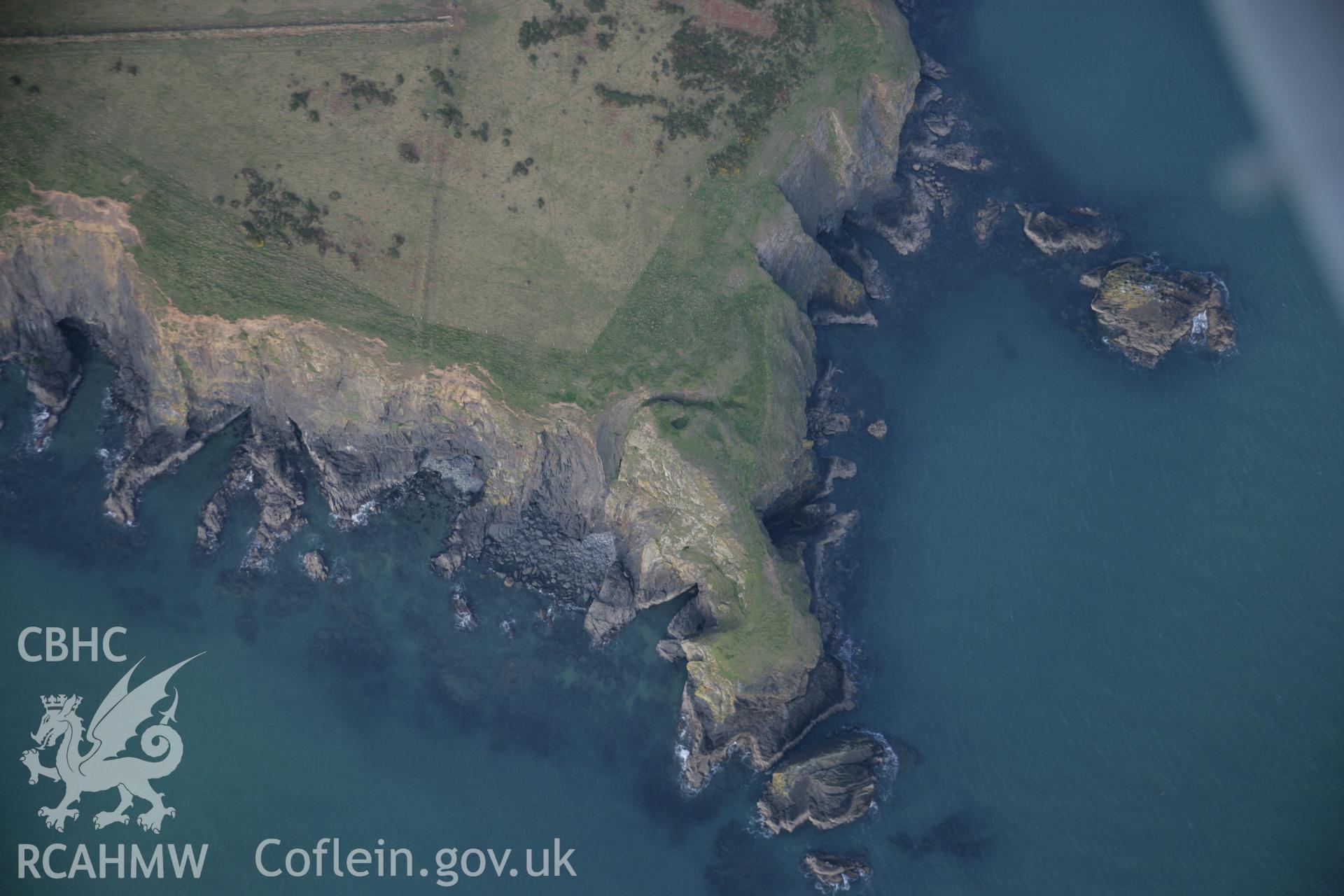 RCAHMW colour oblique aerial photograph of Trwyn Gwningaer from the south. Taken on 09 February 2006 by Toby Driver.