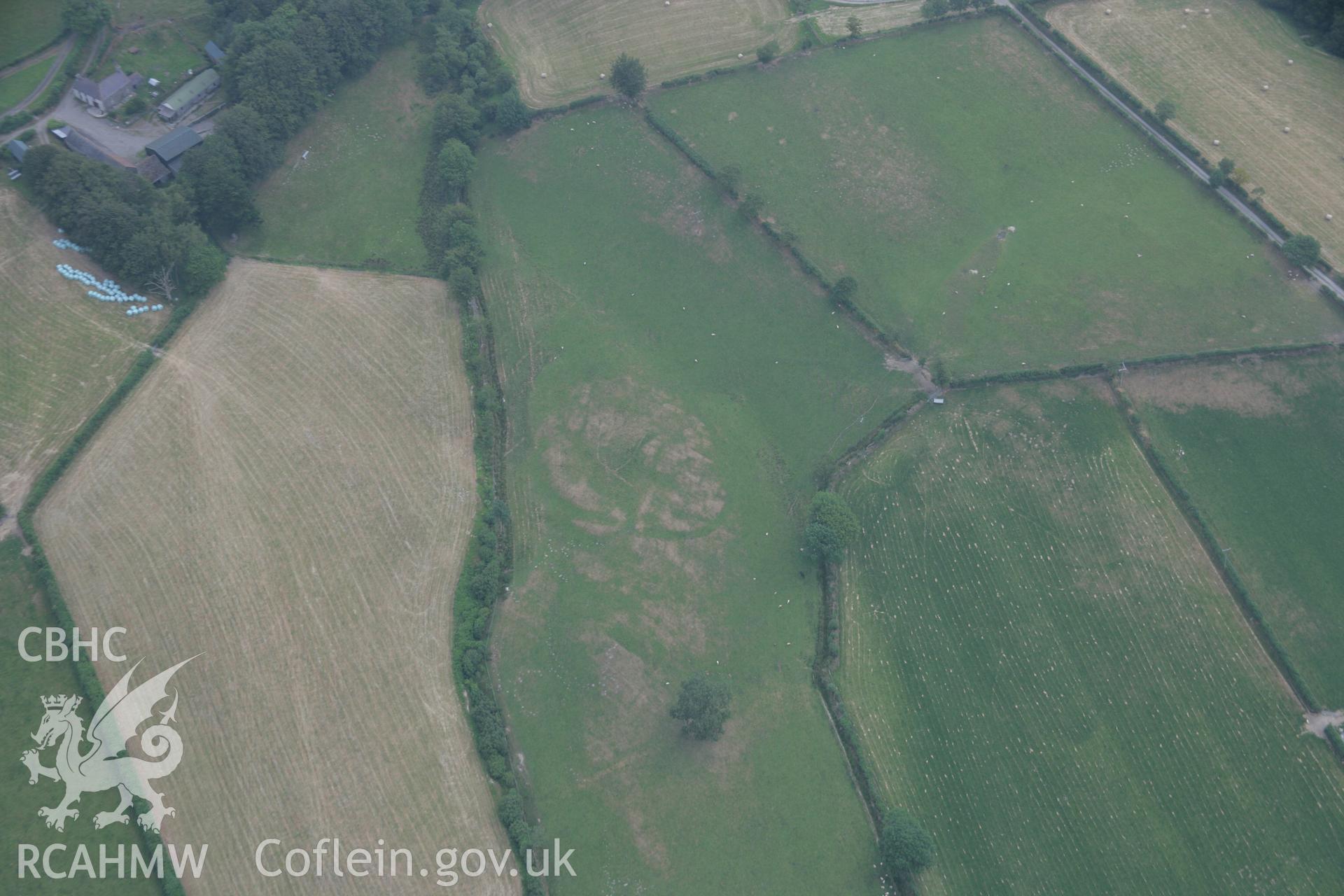 RCAHMW colour oblique aerial photograph of Llwyn-Bwch enclosure southwest. Taken on 21 July 2006 by Toby Driver.