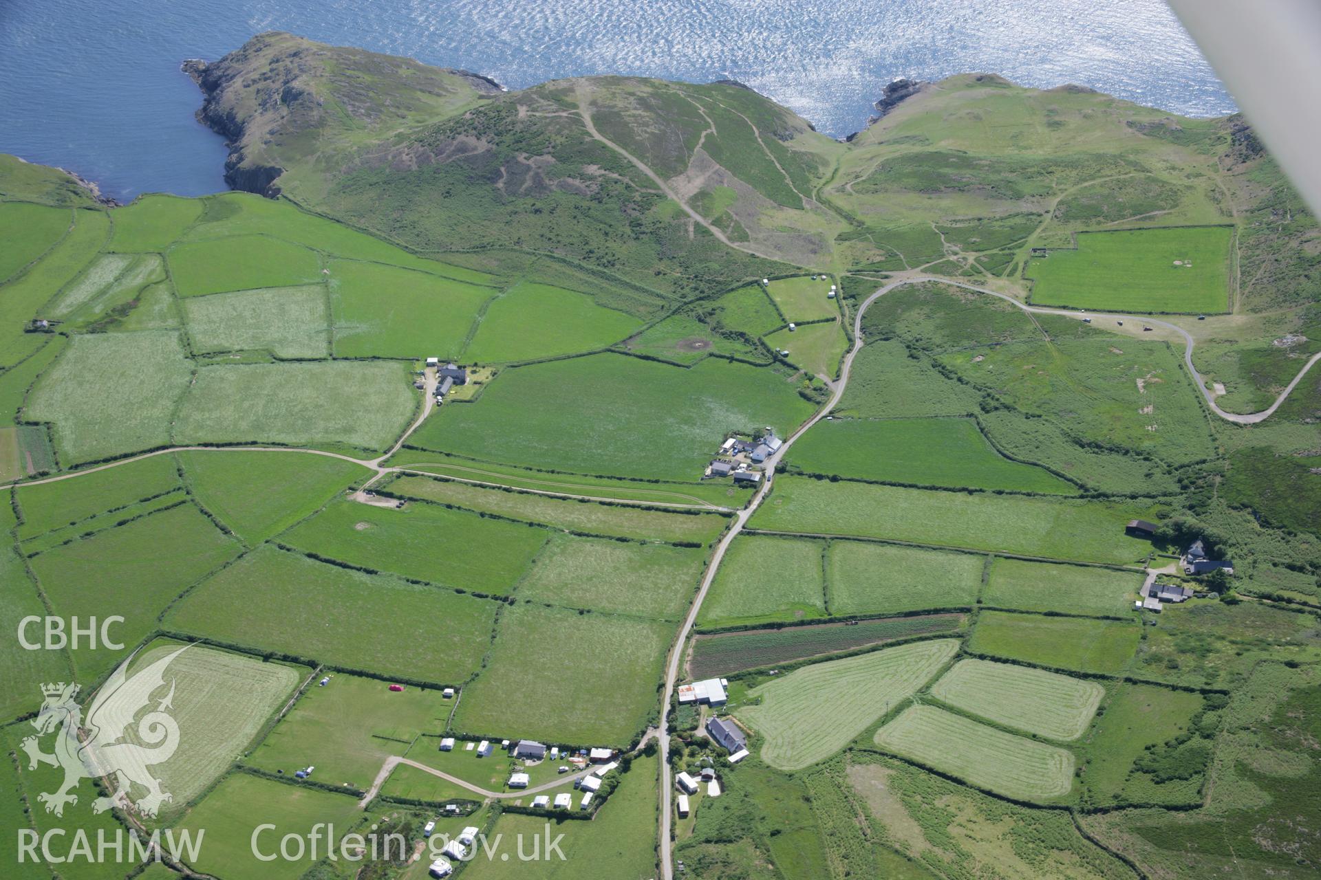 RCAHMW colour oblique aerial photograph of a field system, Mynydd Mawr viewed from Uwchmynydd, from the north-east. Taken on 14 June 2006 by Toby Driver