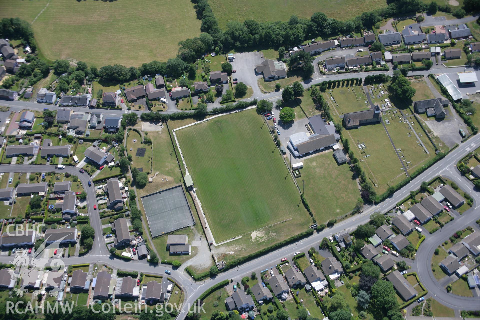 RCAHMW colour oblique aerial photograph of Penrhyncoch Village. Taken on 17 July 2006 by Toby Driver.