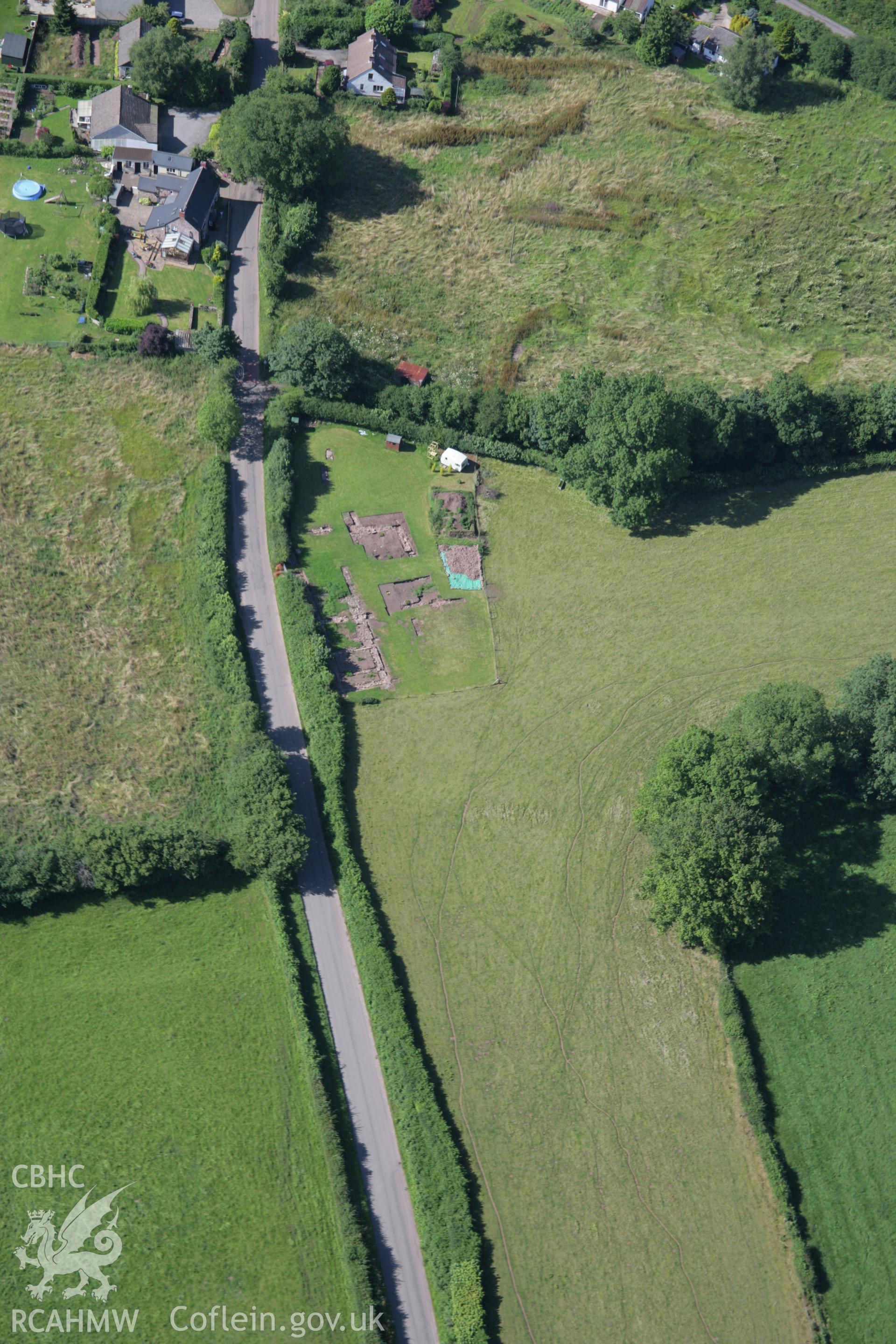 RCAHMW colour oblique aerial photograph of Trelech Village Earthworks. Taken on 13 July 2006 by Toby Driver.