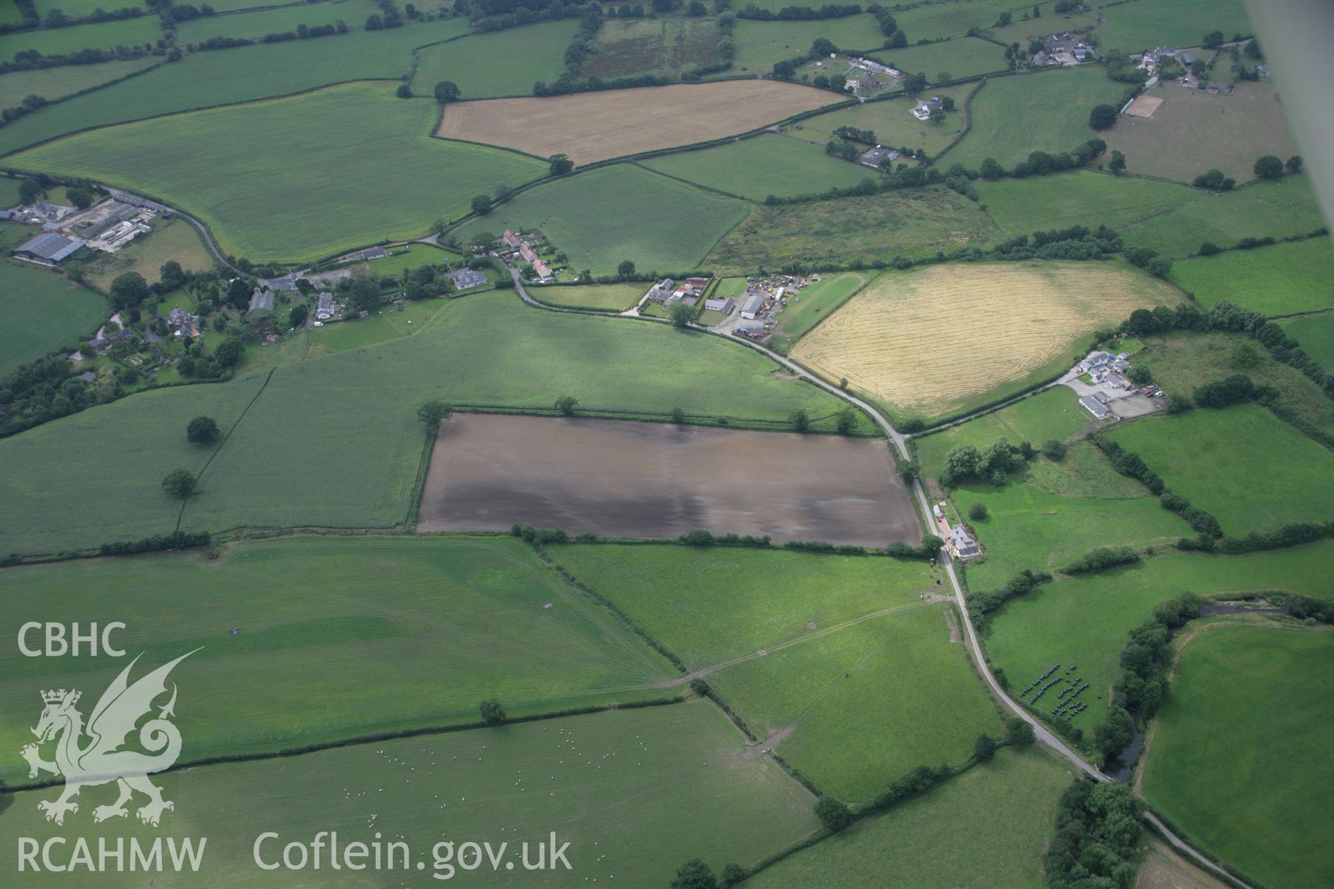 RCAHMW colour oblique aerial photograph of a possible moated site at Pont Perfa. Taken on 14 August 2006 by Toby Driver