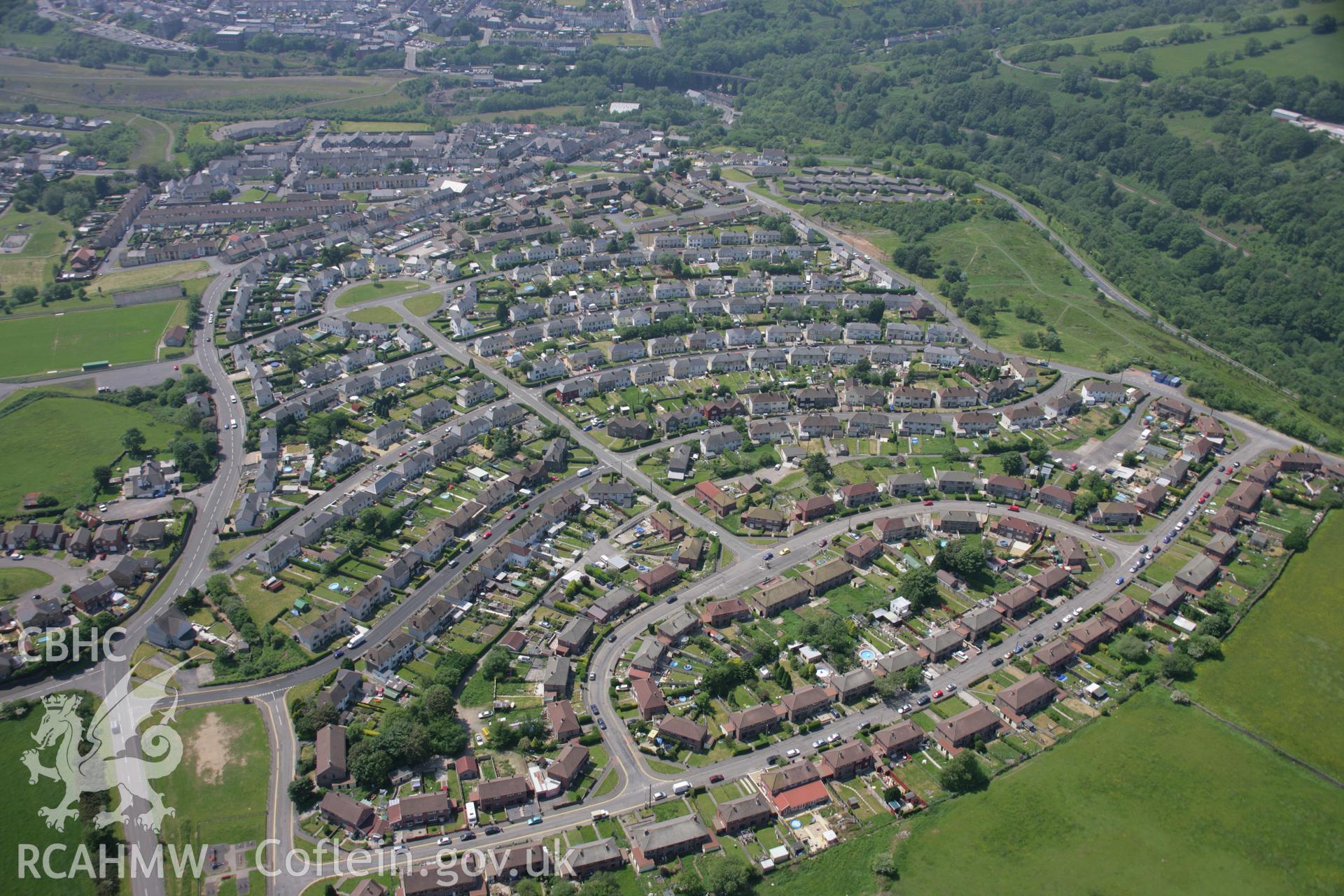 RCAHMW colour oblique aerial photograph of Bargoed, including the housing estate. View from the north-east. Taken on 09 June 2006 by Toby Driver.