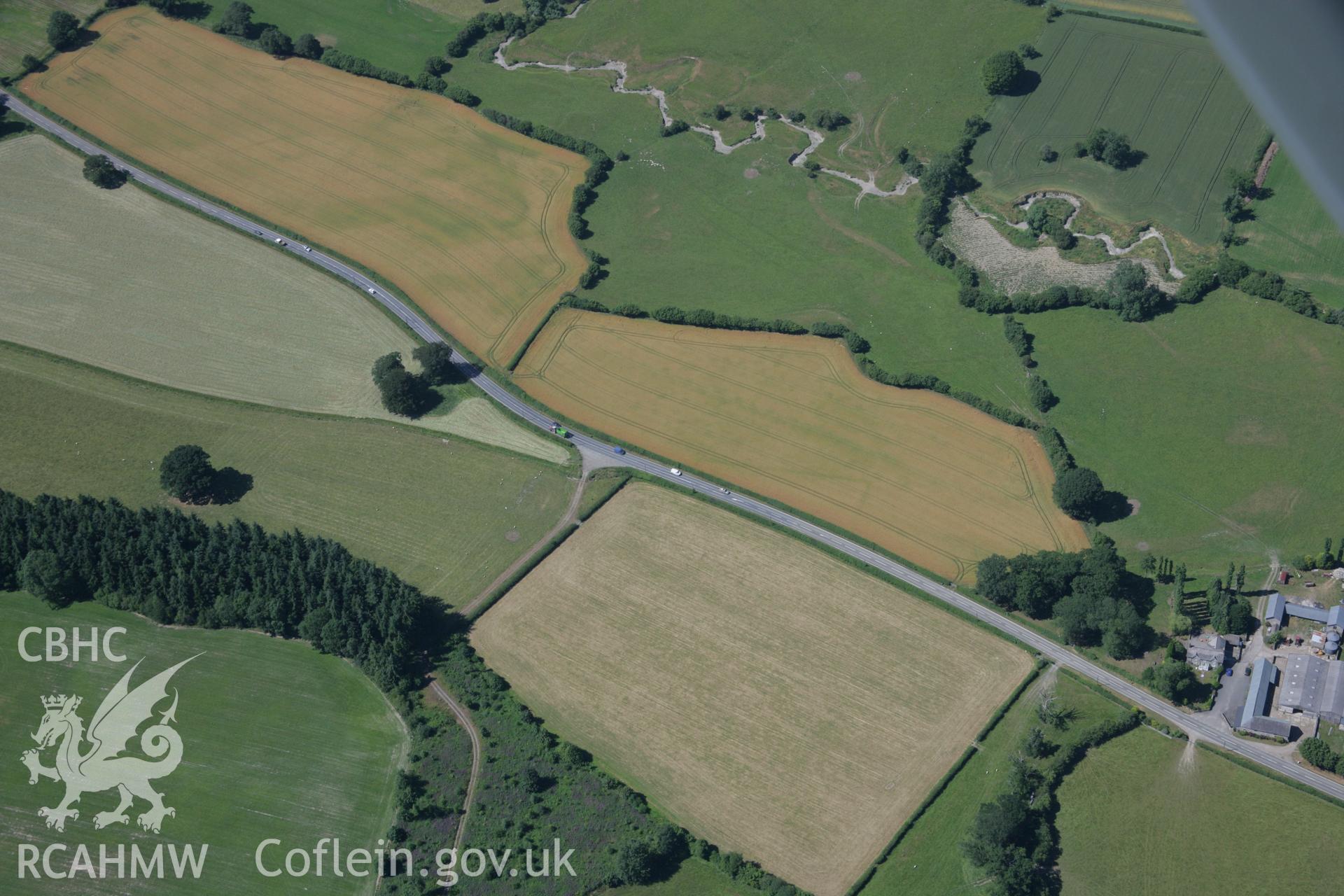 RCAHMW colour oblique aerial photograph of Harpton Court Barrow. Taken on 13 July 2006 by Toby Driver.
