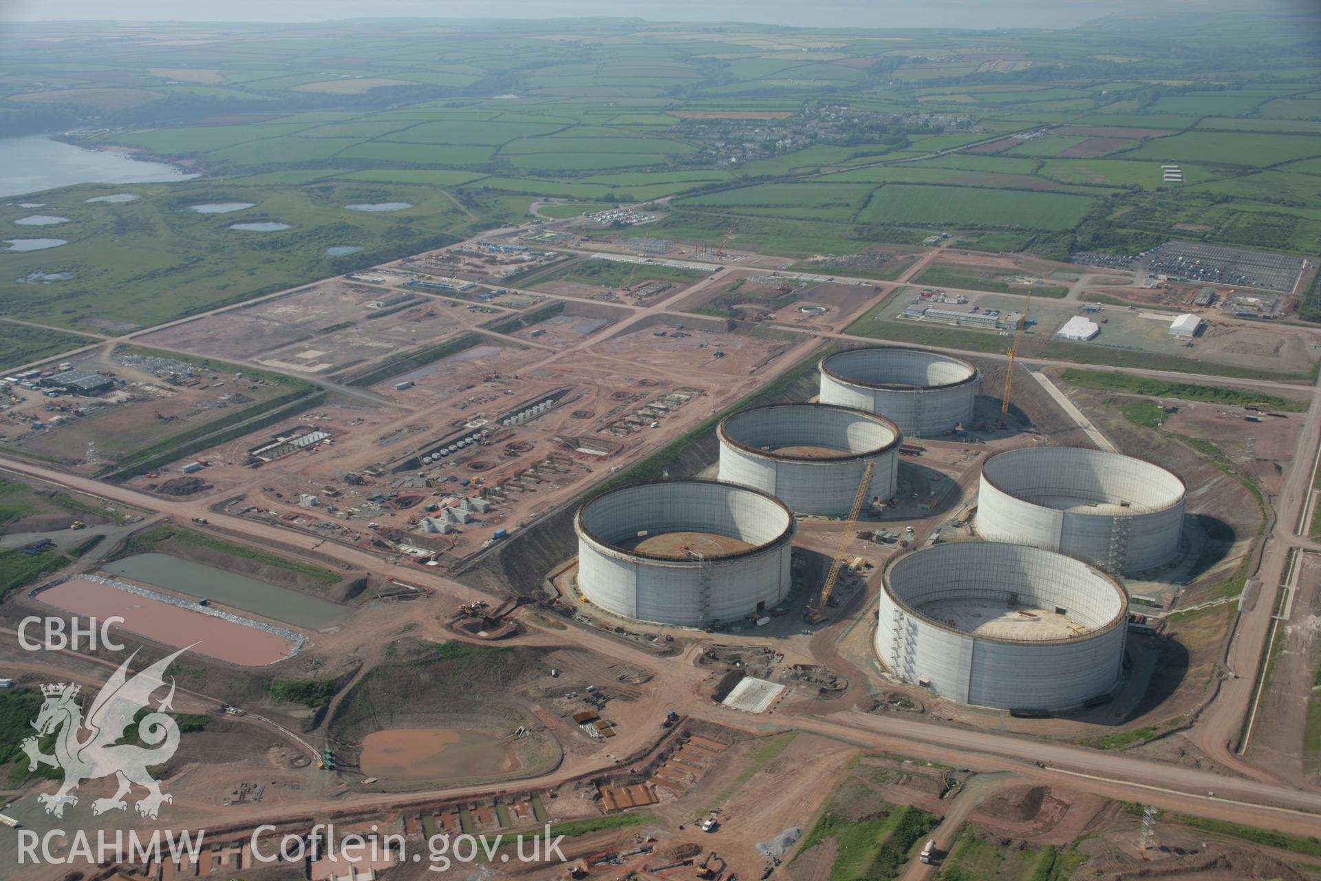 RCAHMW colour oblique aerial photograph of Esso South Hook Oil Refinery and liquid natural gas facility, Milford Haven from the south. Taken on 08 June 2006 by Toby Driver.
