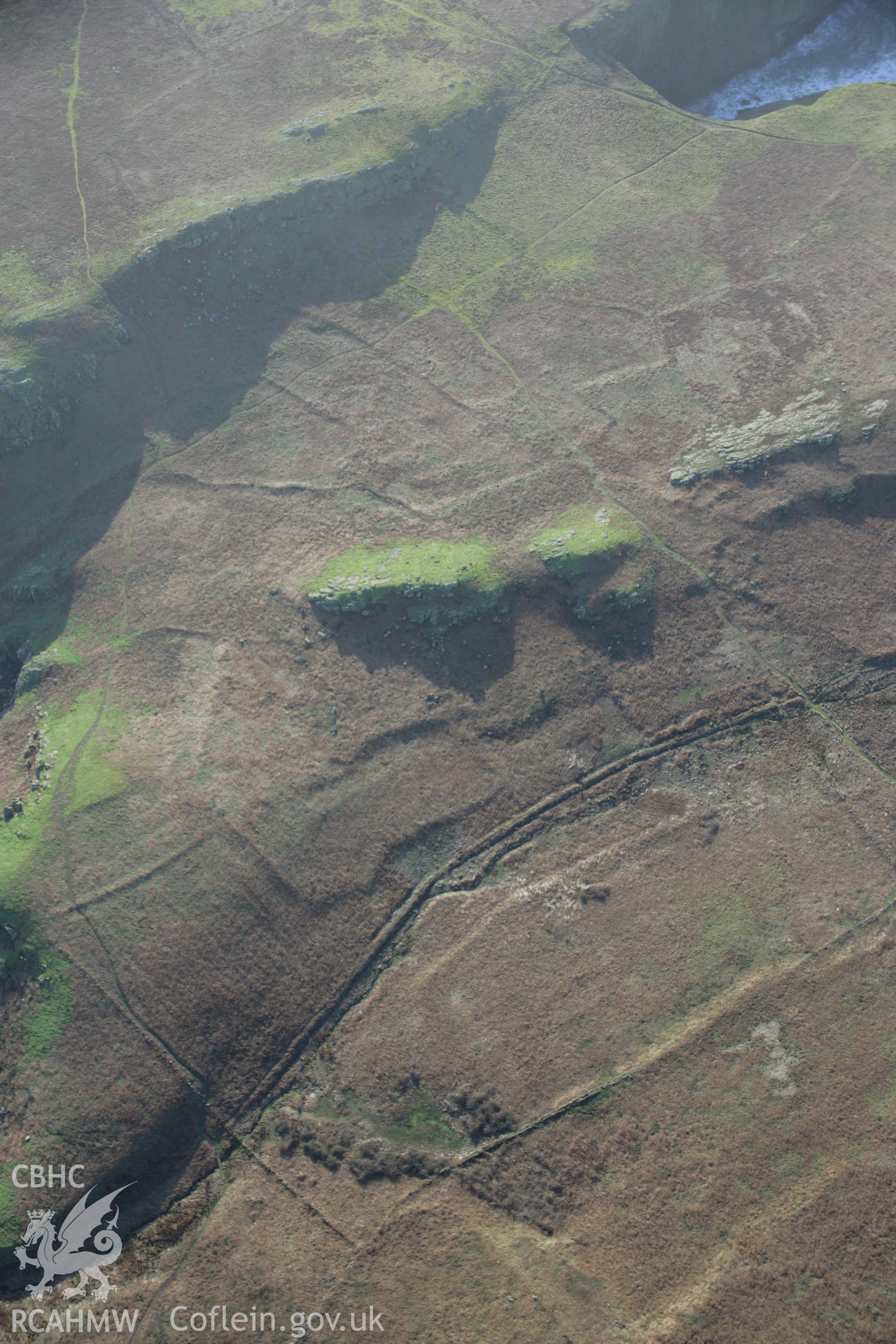 RCAHMW colour oblique aerial photograph of Skomer Island Settlements and Field Systems from the north-east. Taken on 11 January 2006 by Toby Driver.