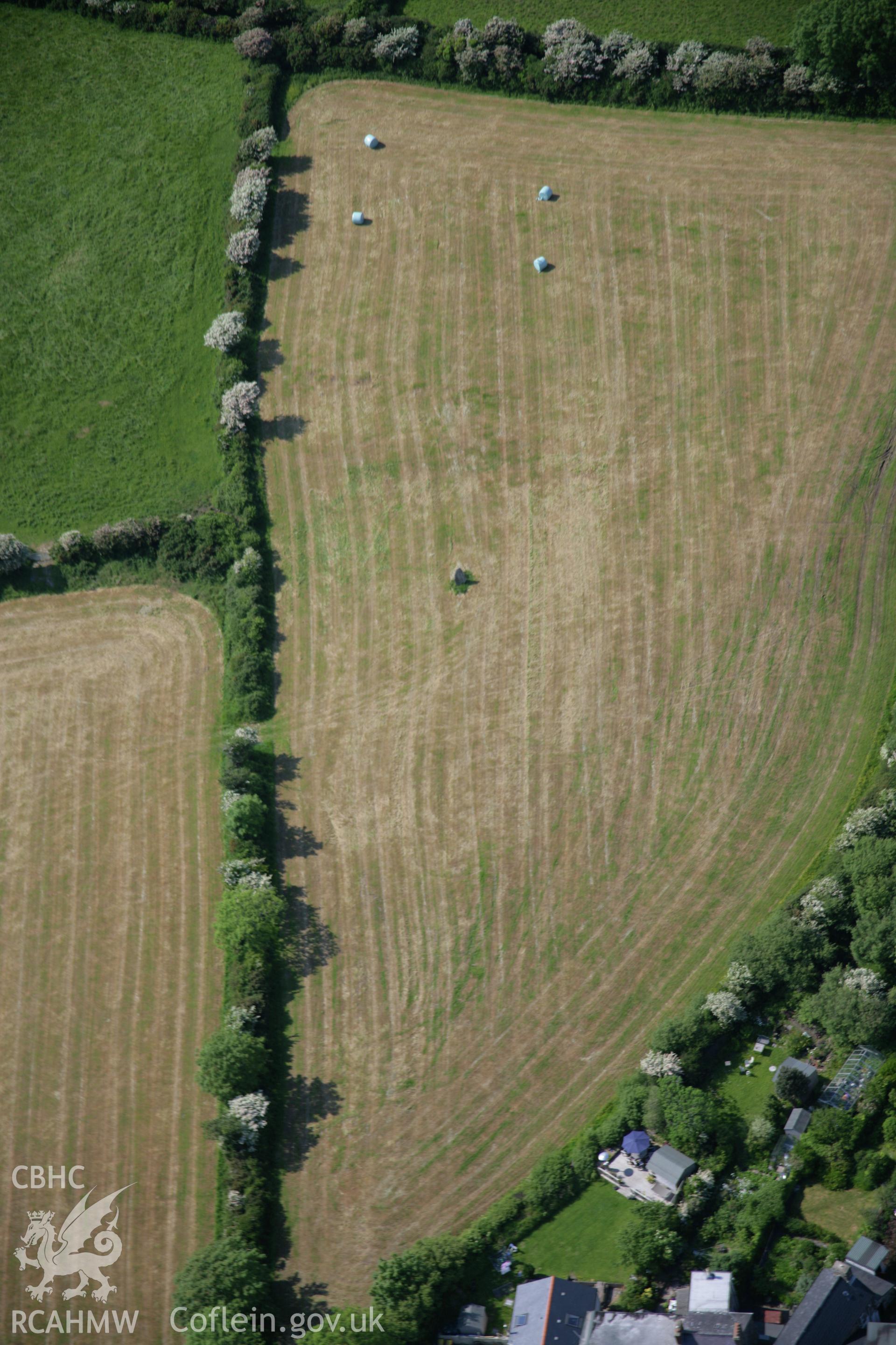 RCAHMW colour oblique aerial photograph of Parc Cerrig Hirion Stone Pair, Dinas, viewed from the south-east. Taken on 08 June 2006 by Toby Driver.