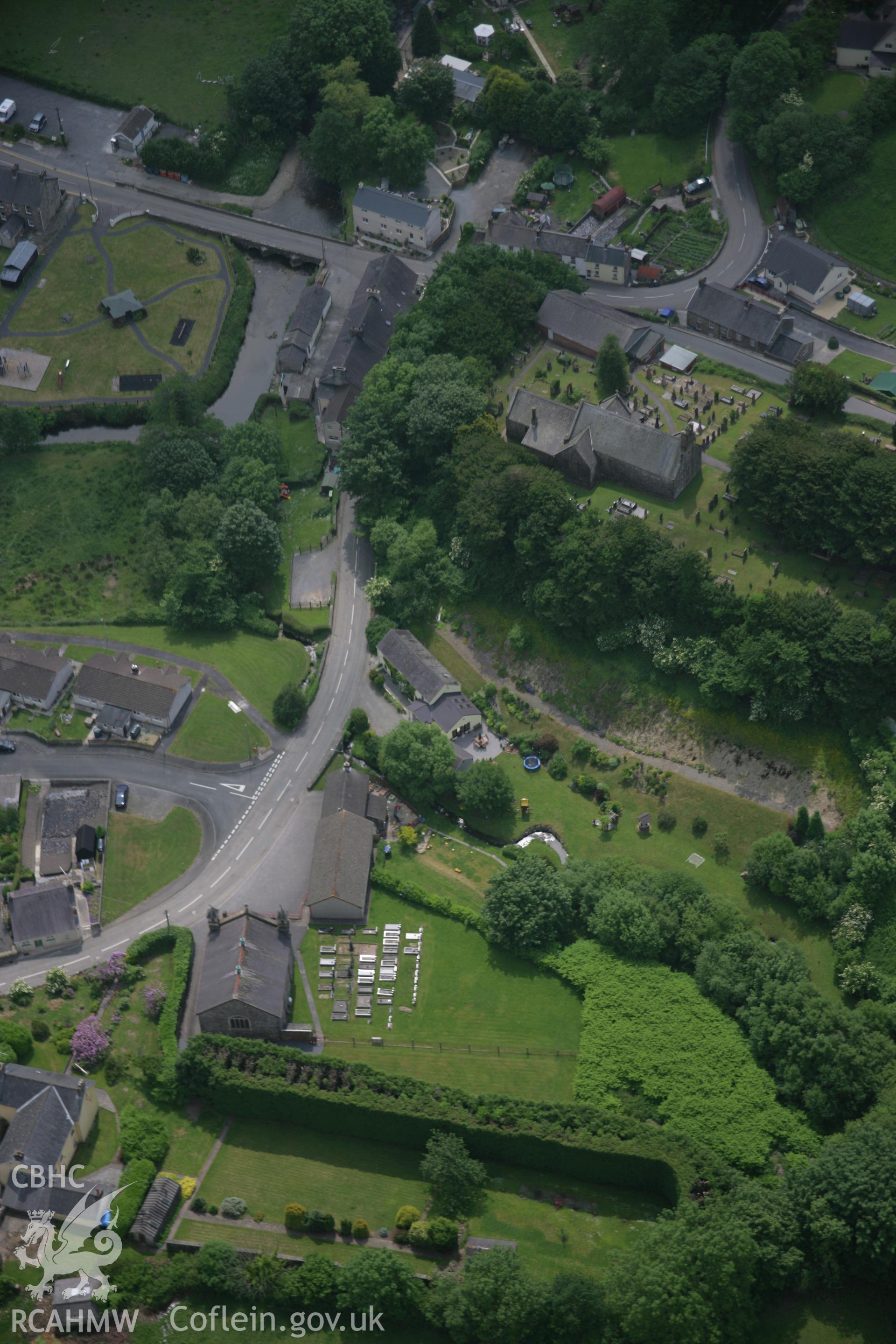 RCAHMW colour oblique aerial photograph of Meidrim village, with St Davids Church, viewed from the north. Taken on 15 June 2006 by Toby Driver