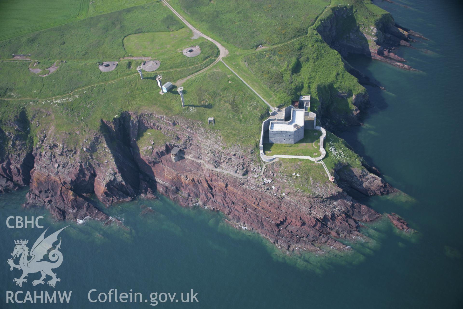RCAHMW colour oblique aerial photograph of West Blockhouse Fort from the south. Taken on 08 June 2006 by Toby Driver.