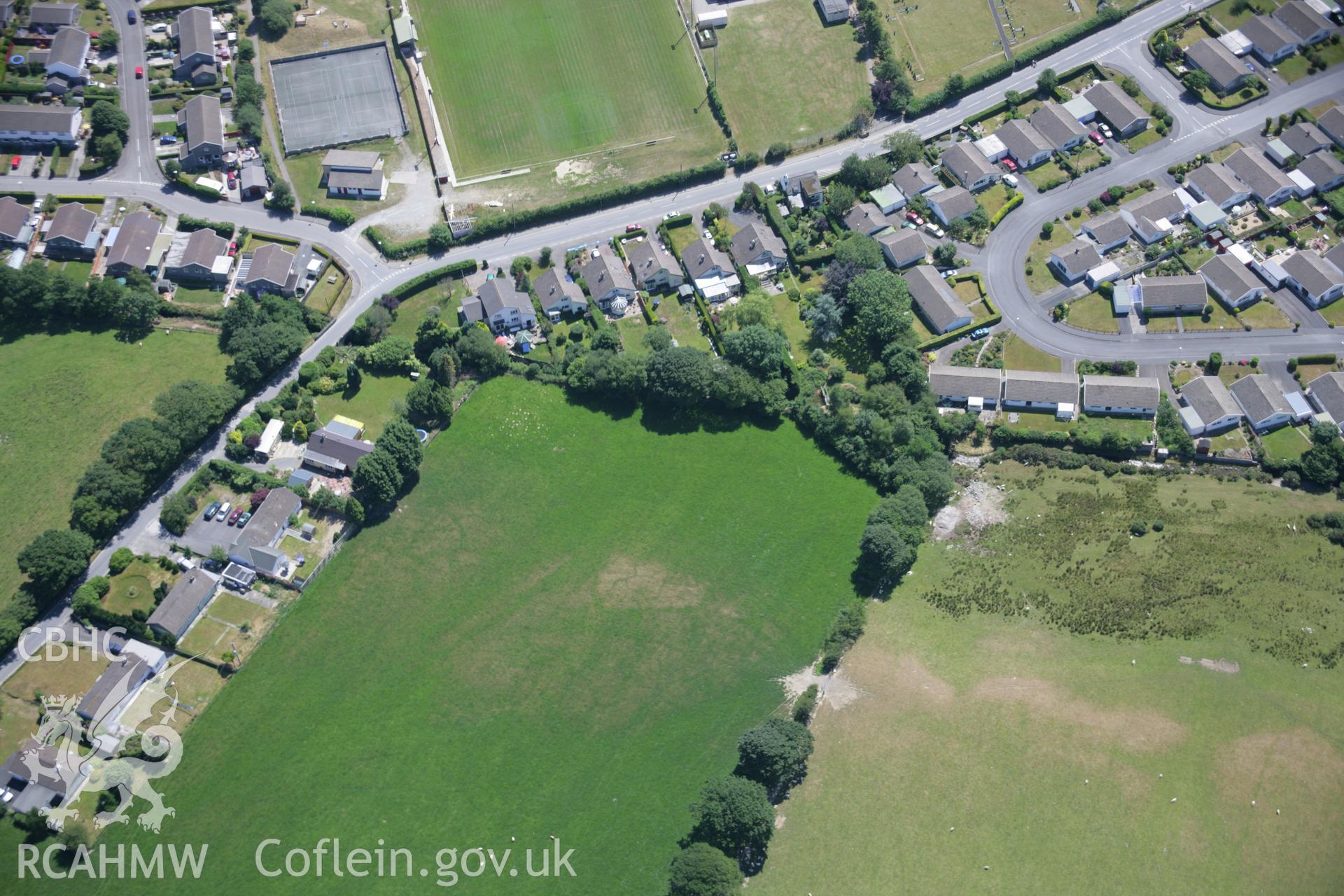 RCAHMW colour oblique aerial photograph of Penrhyncoch Village. Taken on 17 July 2006 by Toby Driver.