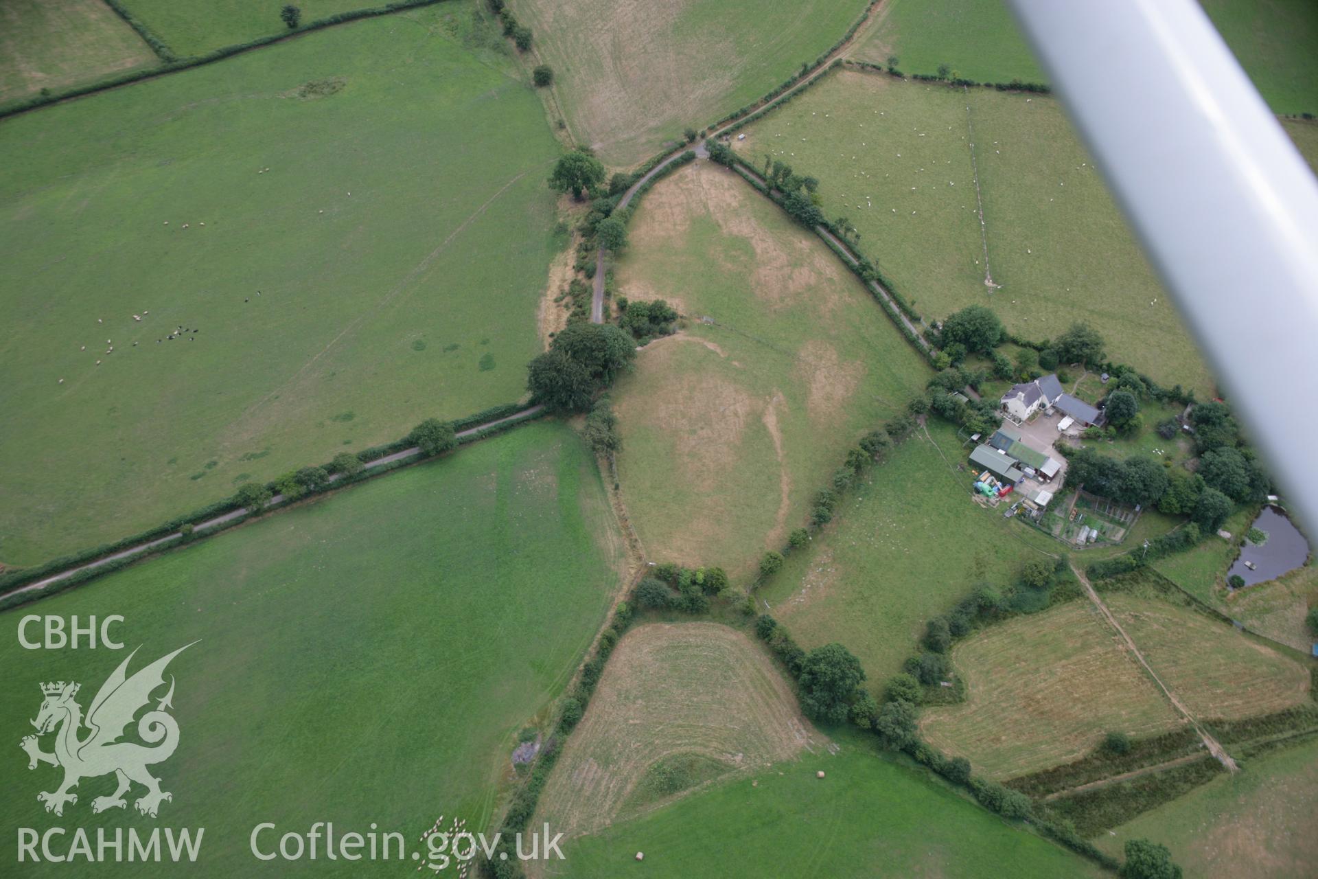 RCAHMW colour oblique aerial photograph of Pen-y-Gaer Hillfort, Deri-Odwyn. Taken on 27 July 2006 by Toby Driver.