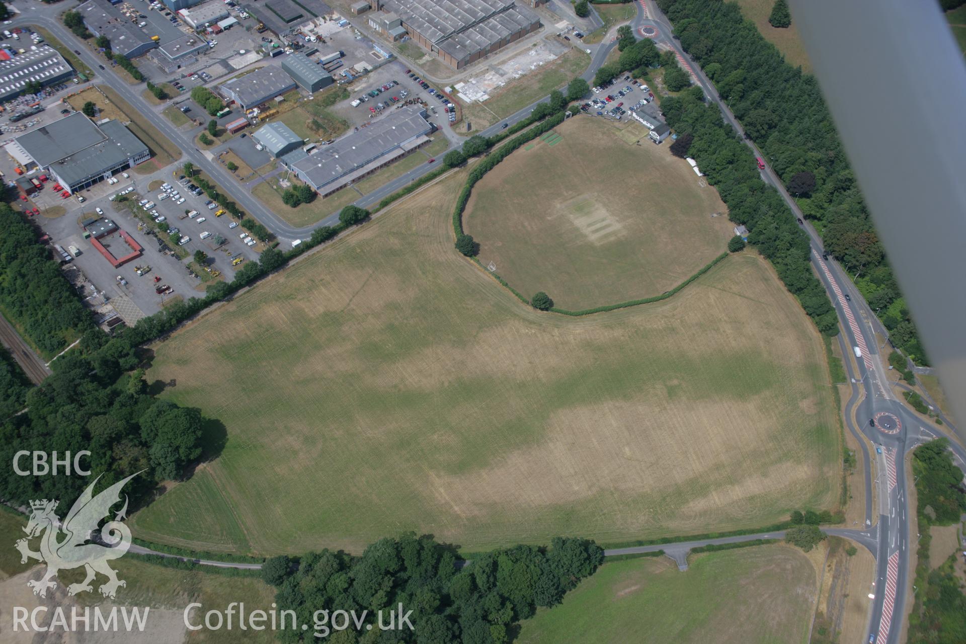 RCAHMW colour oblique aerial photograph of Llandegai Henge Monuments and Cursus. Taken on 25 July 2006 by Toby Driver.